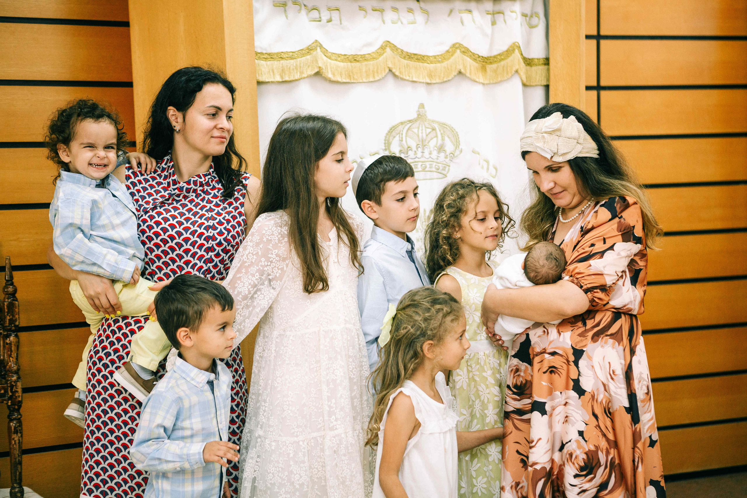 BRITH MILA IN THE SMALL SYNAGOGUE. PHOTOGRAPHER IN ISRAEL