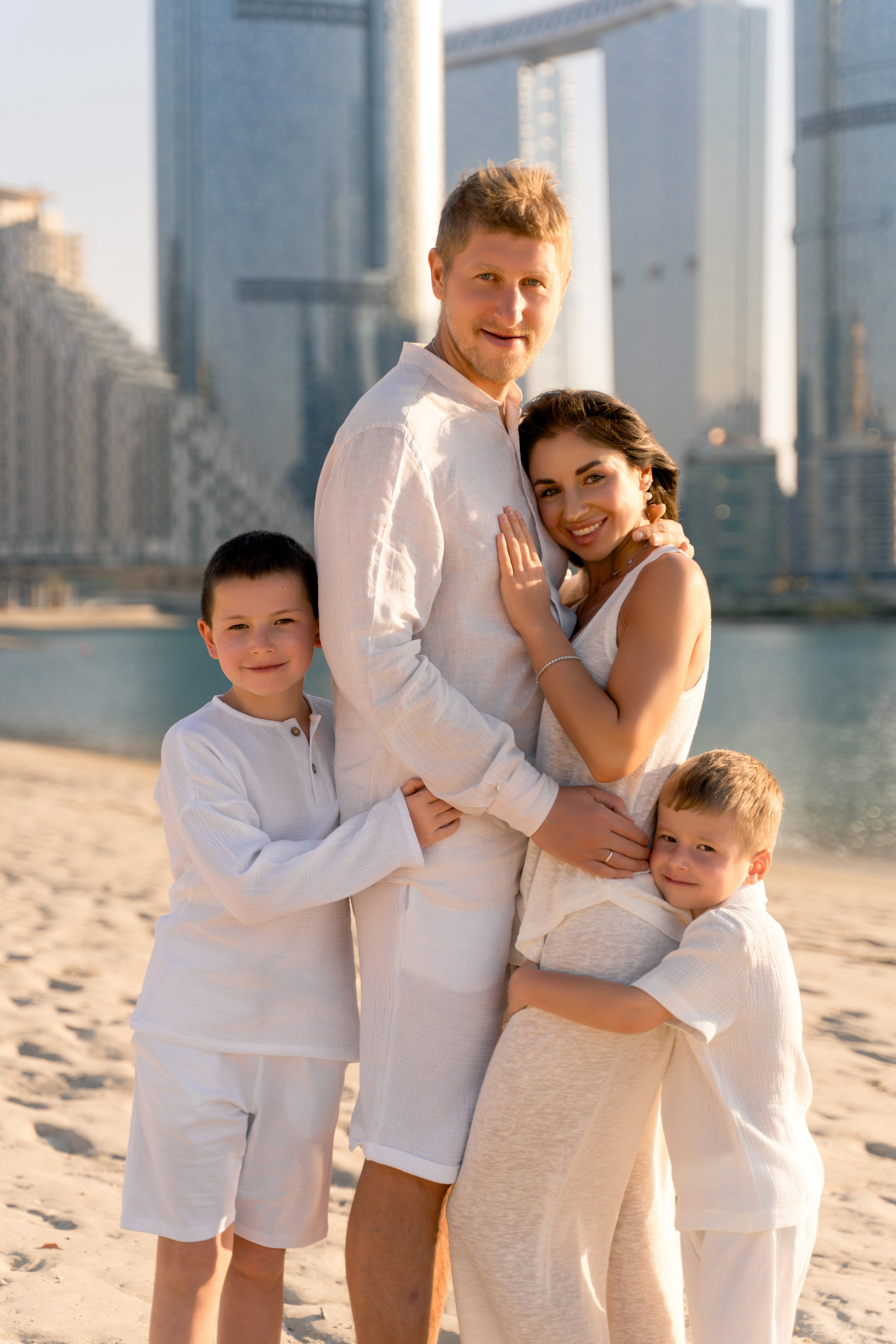 Outdoor family photoshoot at Reem Island Abu Dhabi with modern city background