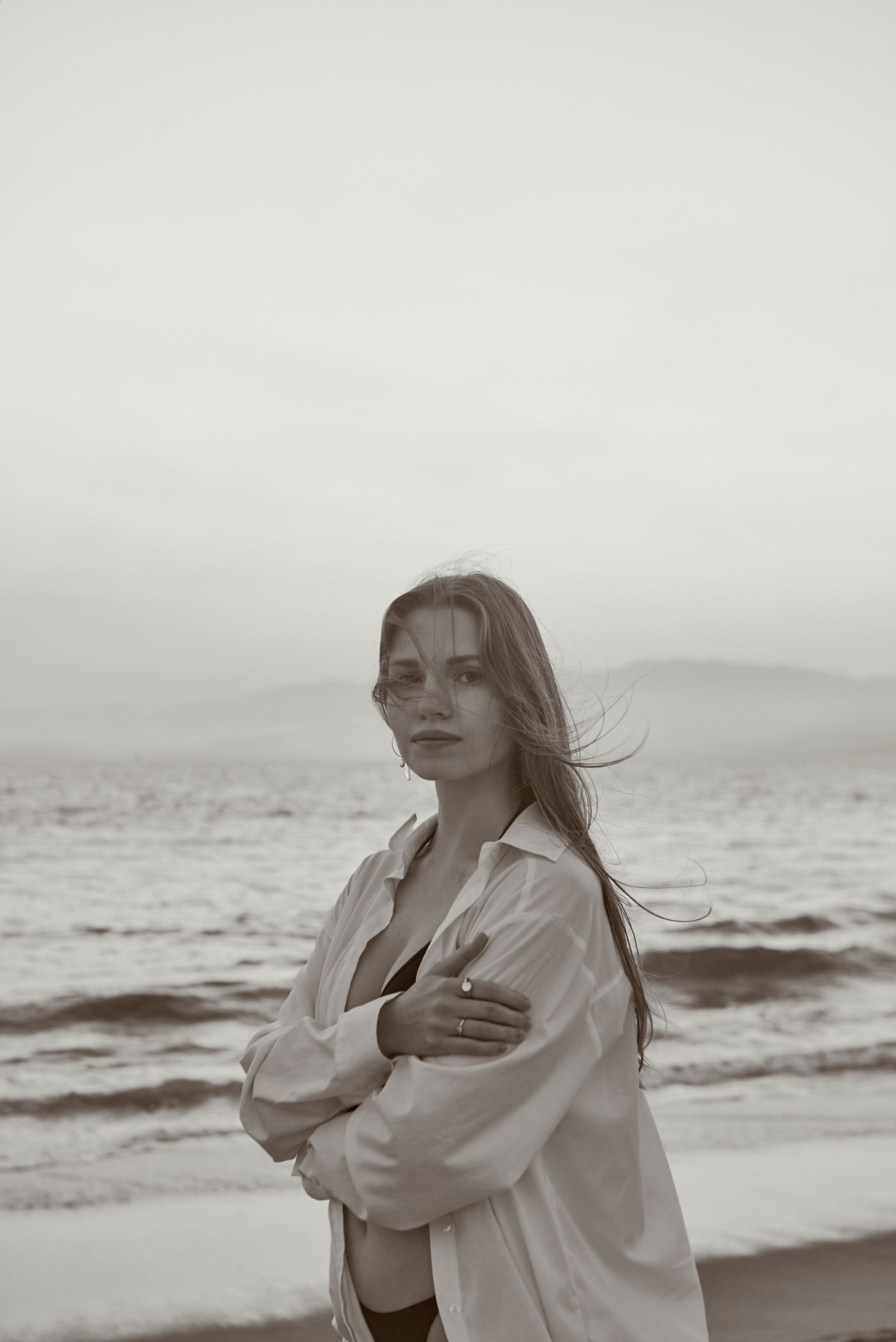 Girl at Santa Monica Beach in the golden glow of sunset