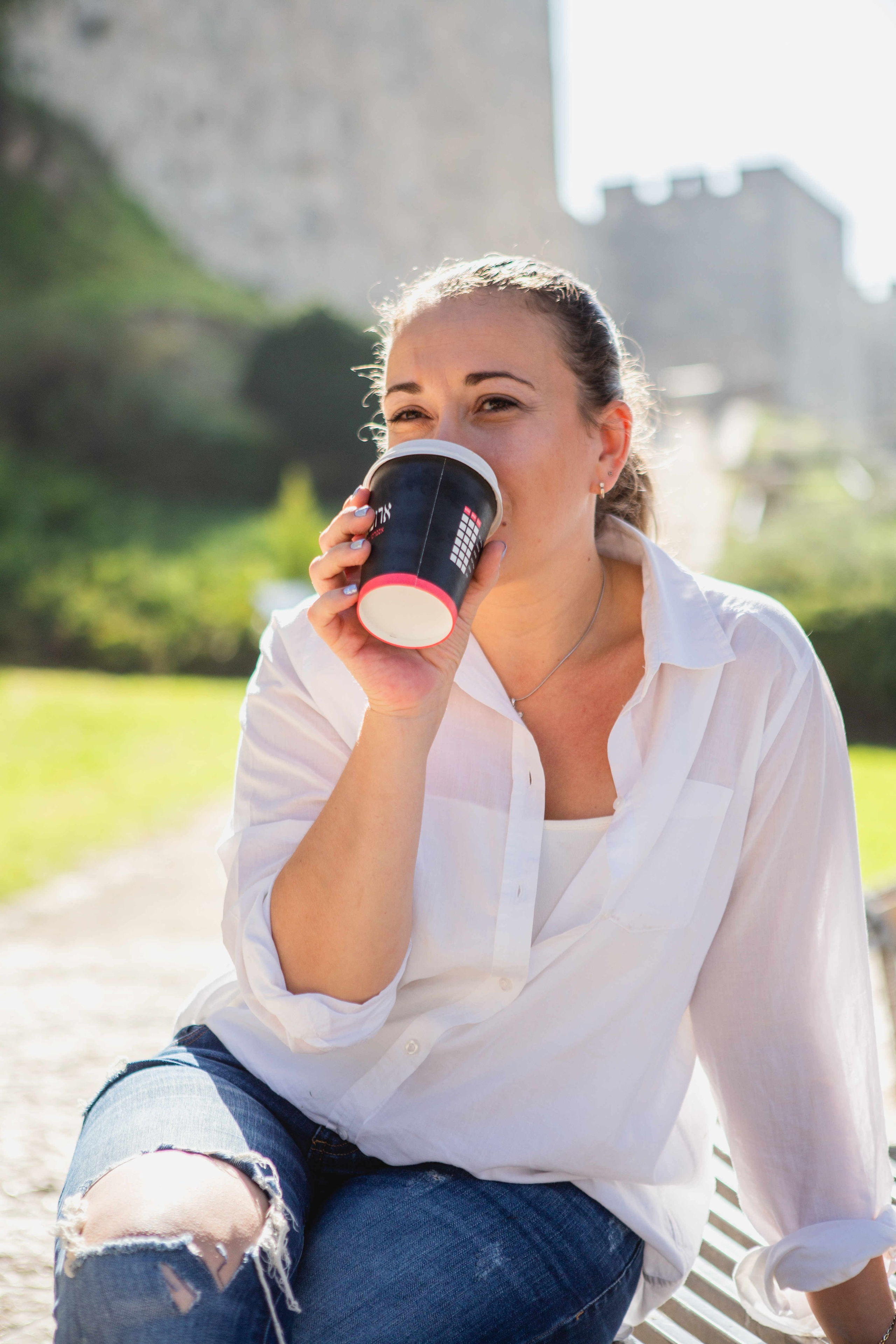 AT THE WALLS OF THE OLD CITY. PHOTOGRAPHER IN ISRAEL