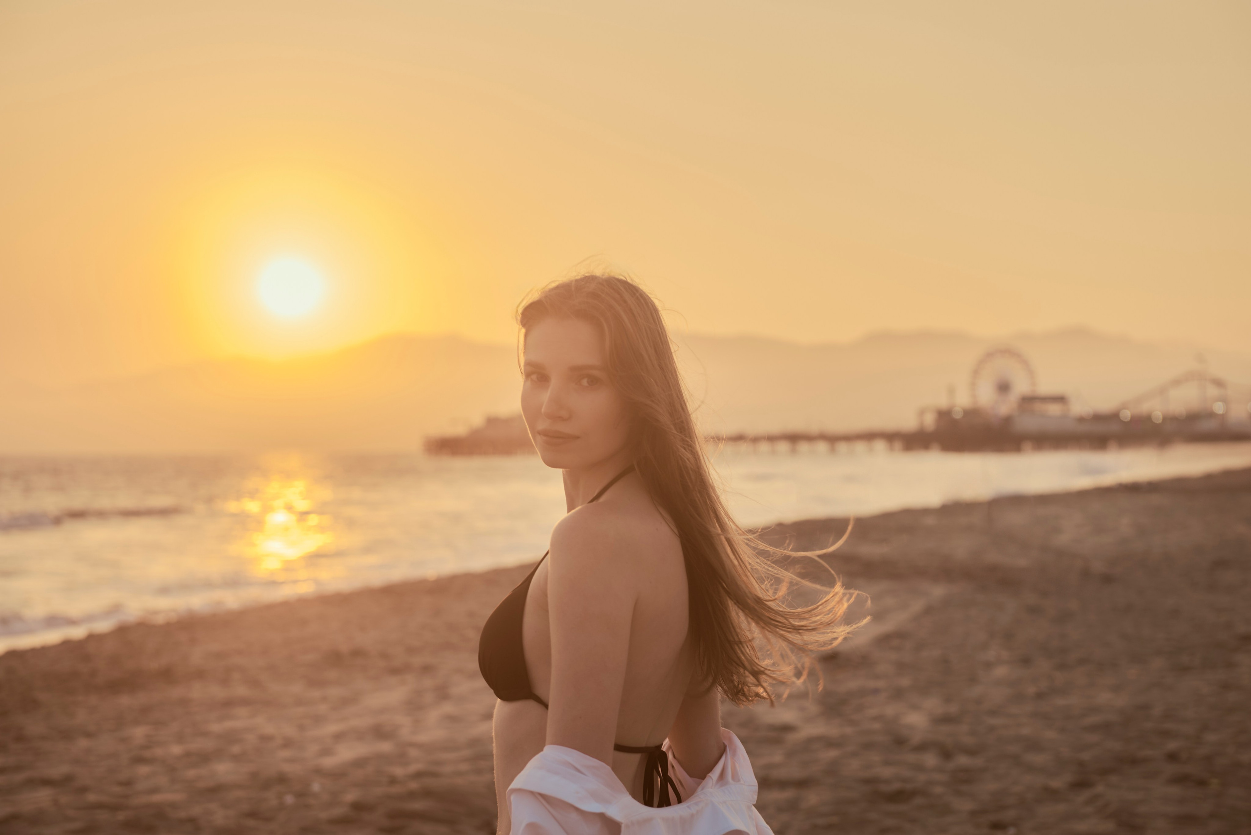 Feminine beauty against the ocean in Los Angeles