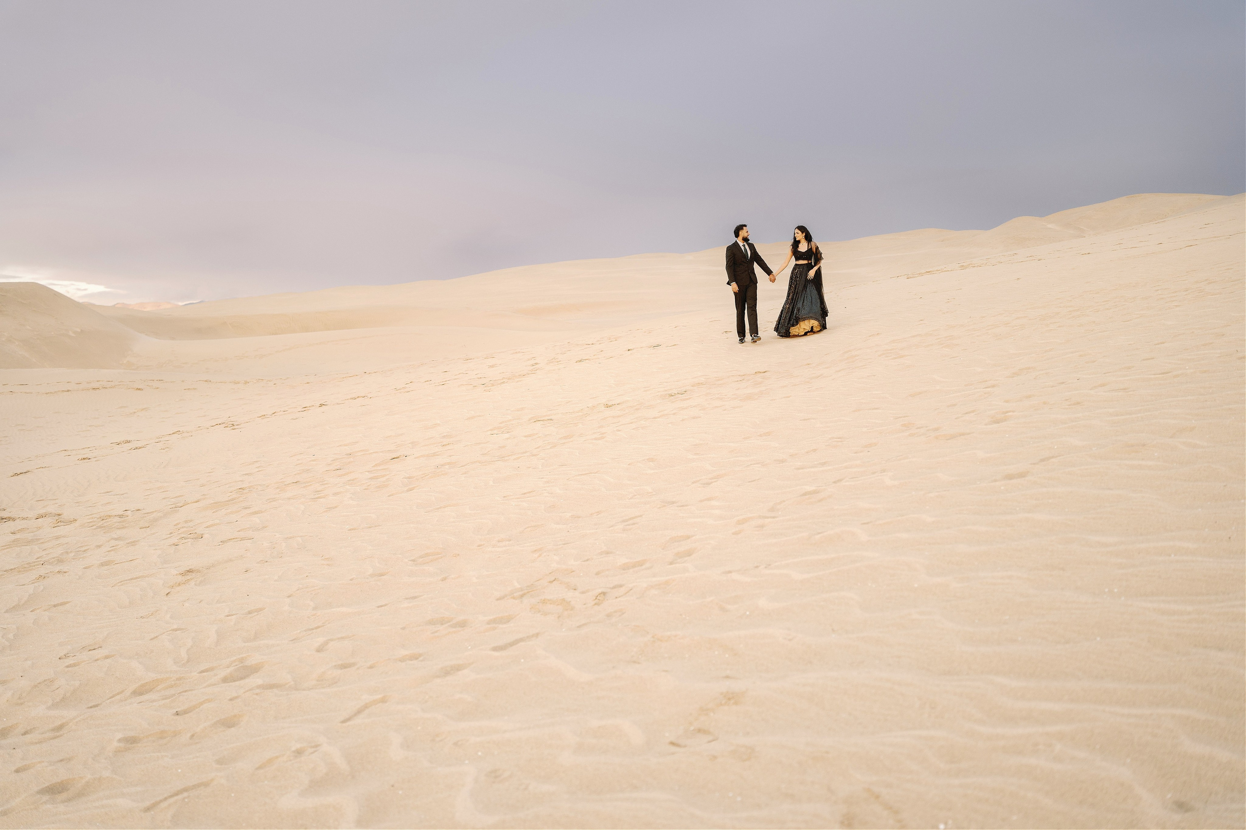 Elopement at Pismo Beach Sand Dunes, California. Wedding Photography & Videography Team in California, Los Angeles, San Francisco, San Diego and Travel