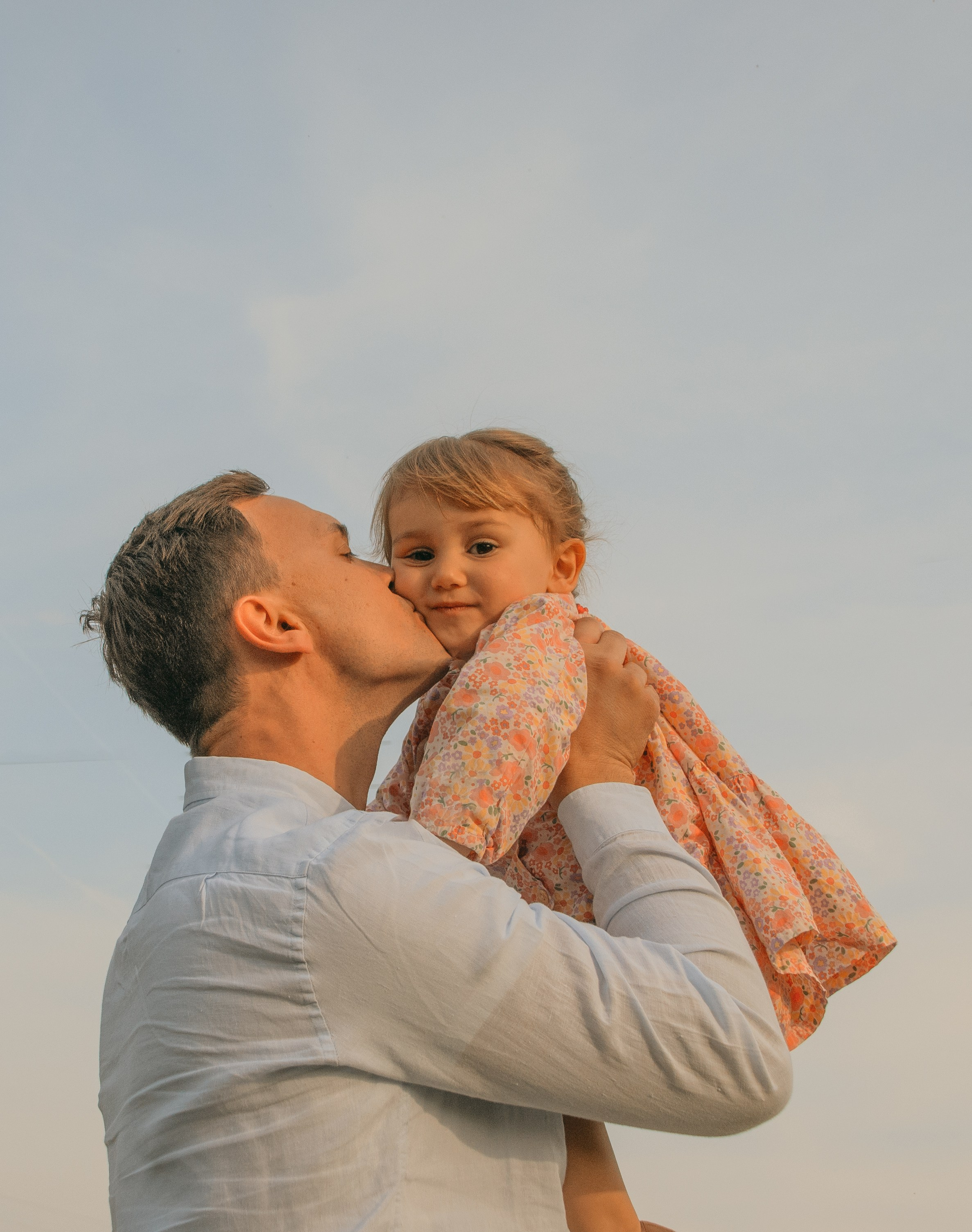 Beautiful little girl with her dad in Milan. Family photoshooting in Milan
