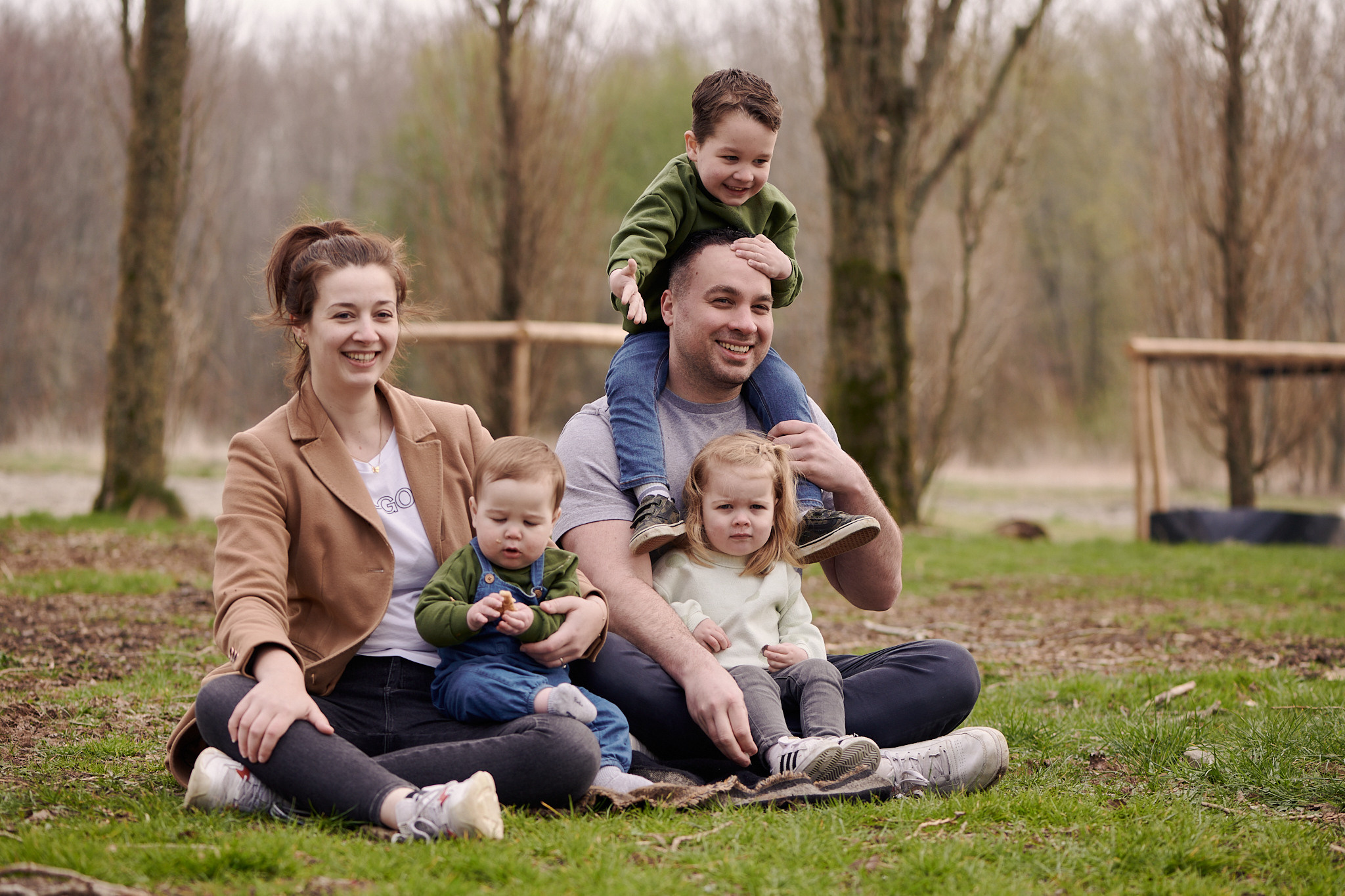Family photo on a walk in the forest 