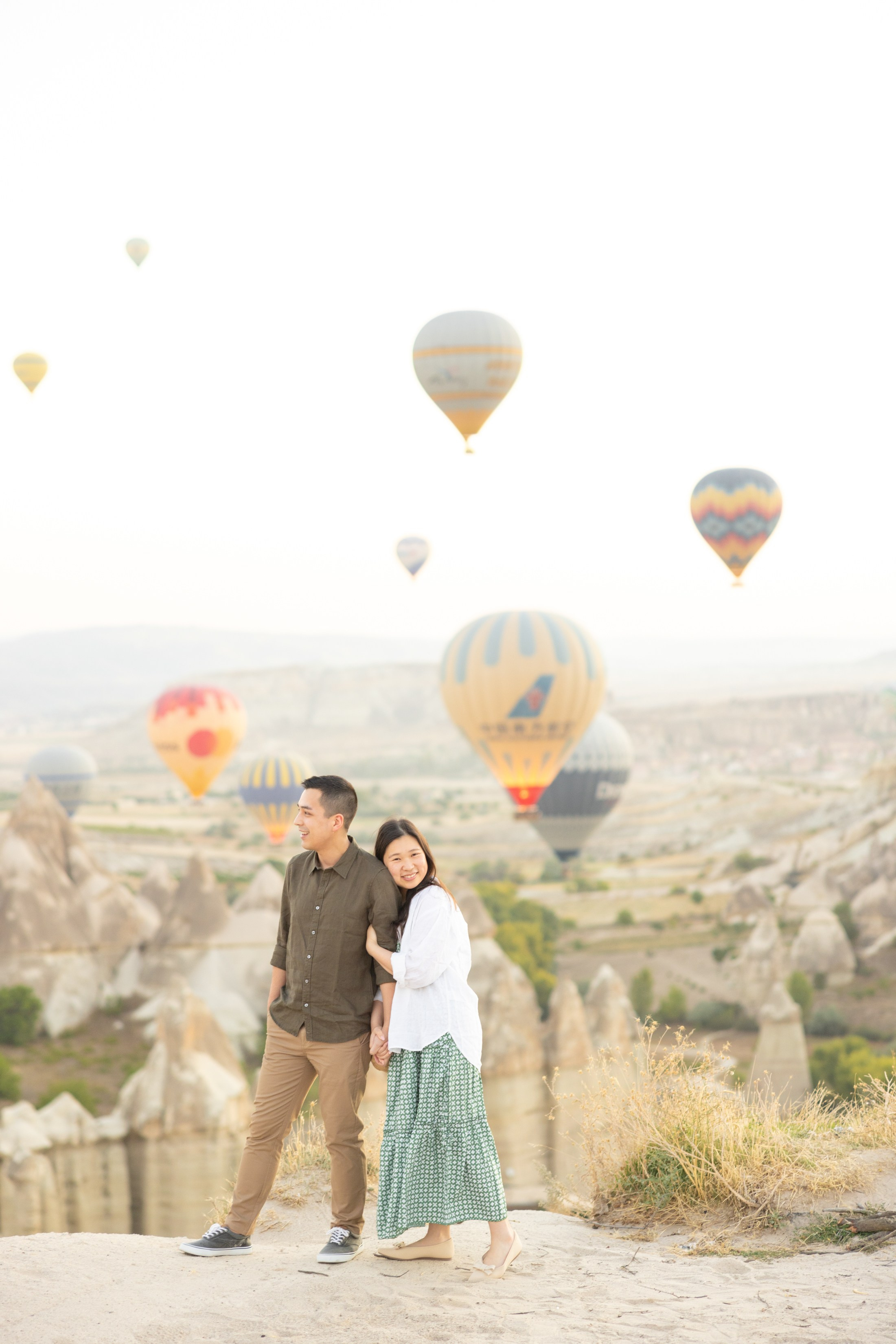 Romantic Love Story Photoshoot with Hot Air Balloons in Cappadocia. Julia Ganch I Fashion Wedding Photography I Cappadocia Turkey