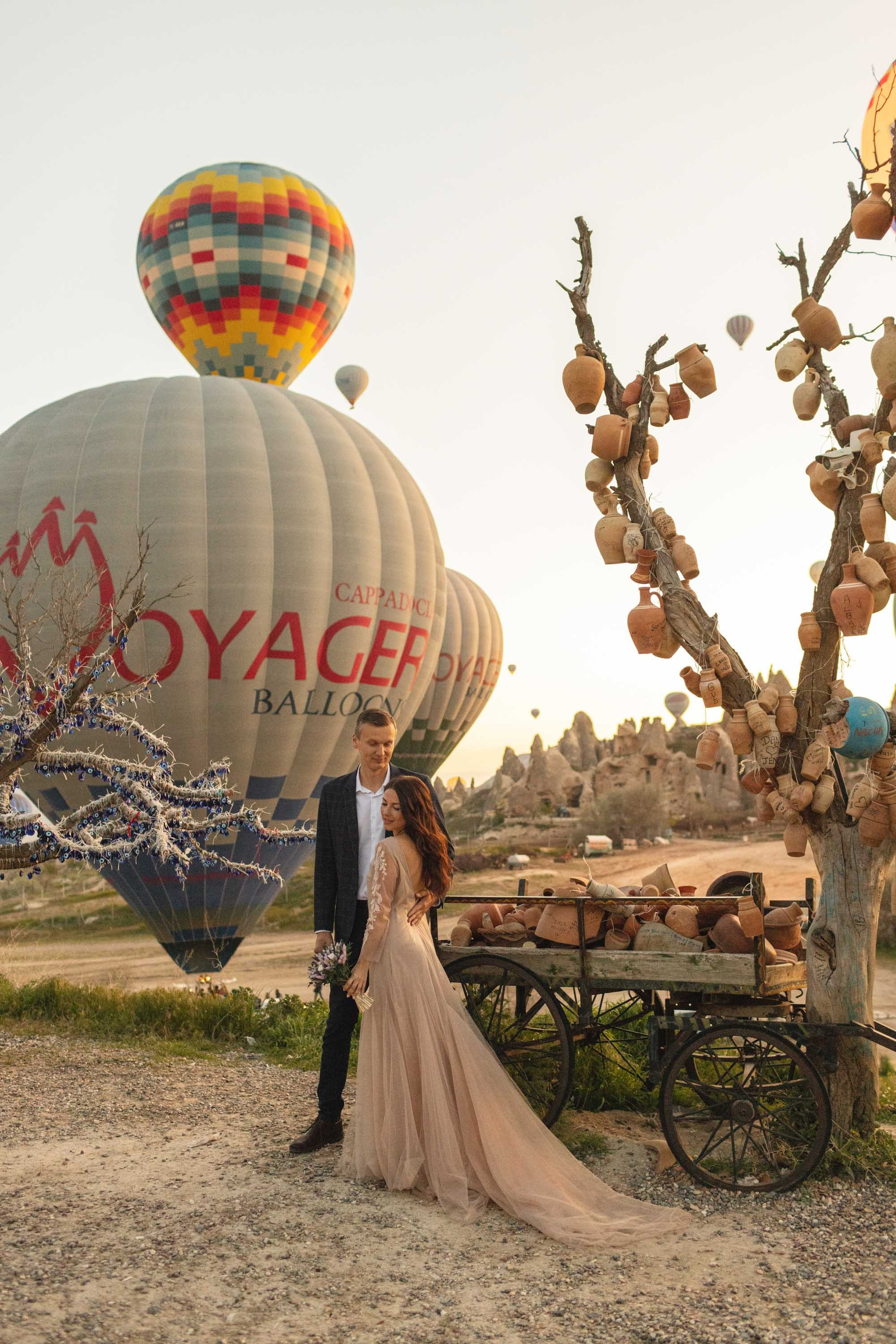 Magical Wedding Photoshoot in Cappadocia: Balloons, Caves, and Valleys. Julia Ganch I Fashion Wedding Photography I Cappadocia Turkey