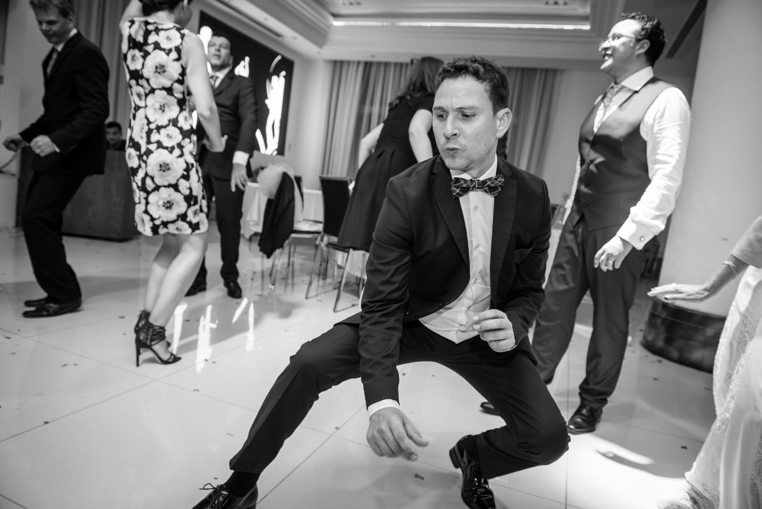 Michael's brother showing his dance moves on the dance floor during the reception at the Leonardo Hotel in Haifa, Israel