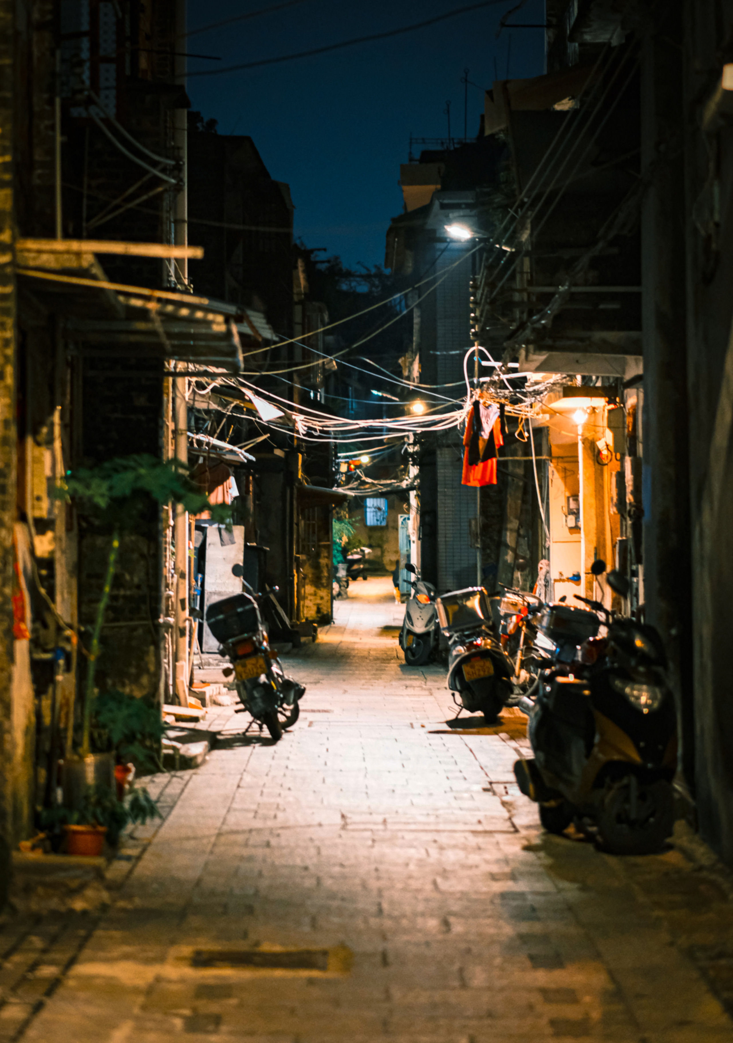 Chinese streets in Chinatown | Jiangmen City | Street Photography | Jiangmen Street Photos | China Street Photography. Camera: FUJIFILM X-Pro3 56mm F1.2 | Location: 江门市启明里 | Yuko Photography