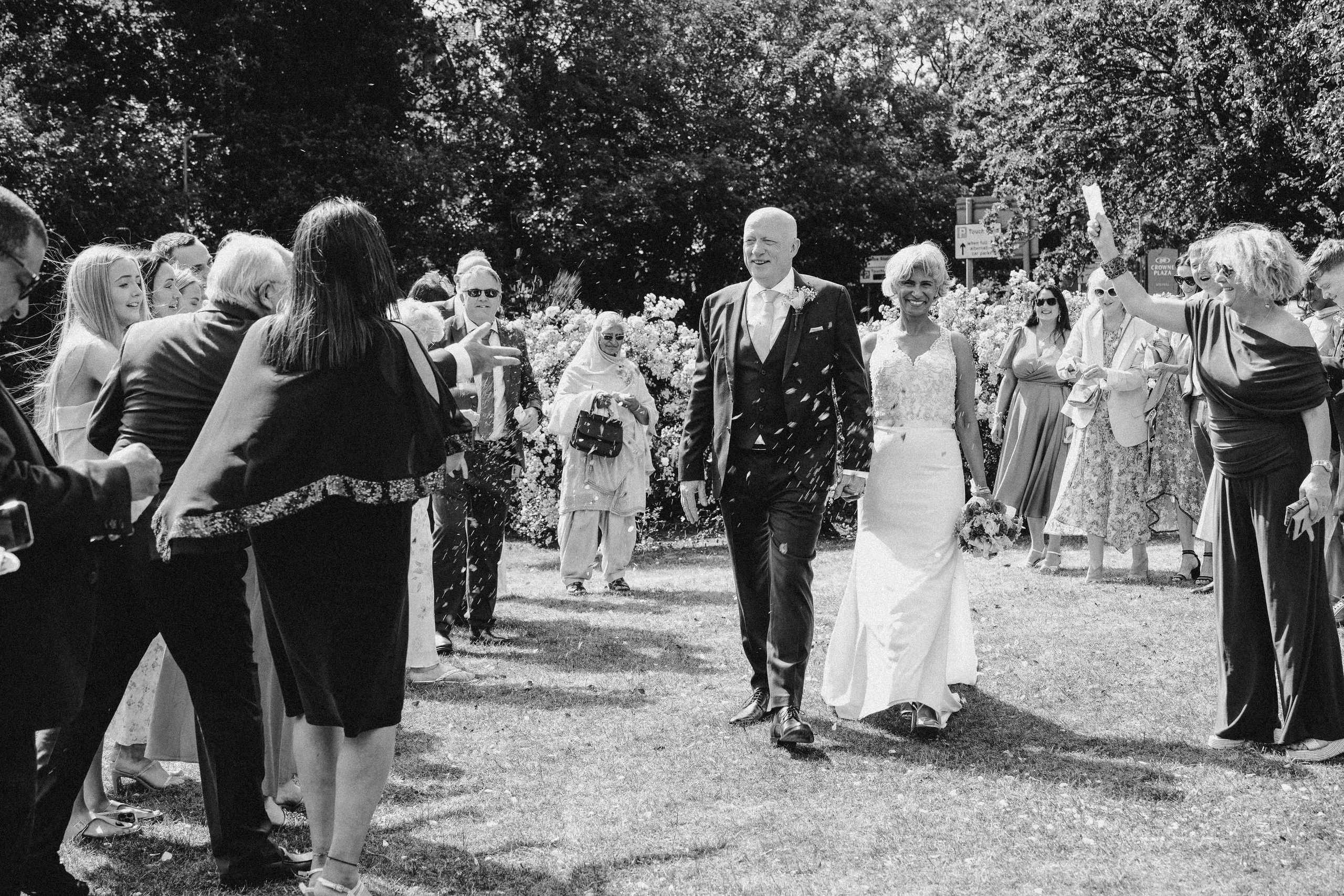Guests throwing confetti outside the registry office in Solihull