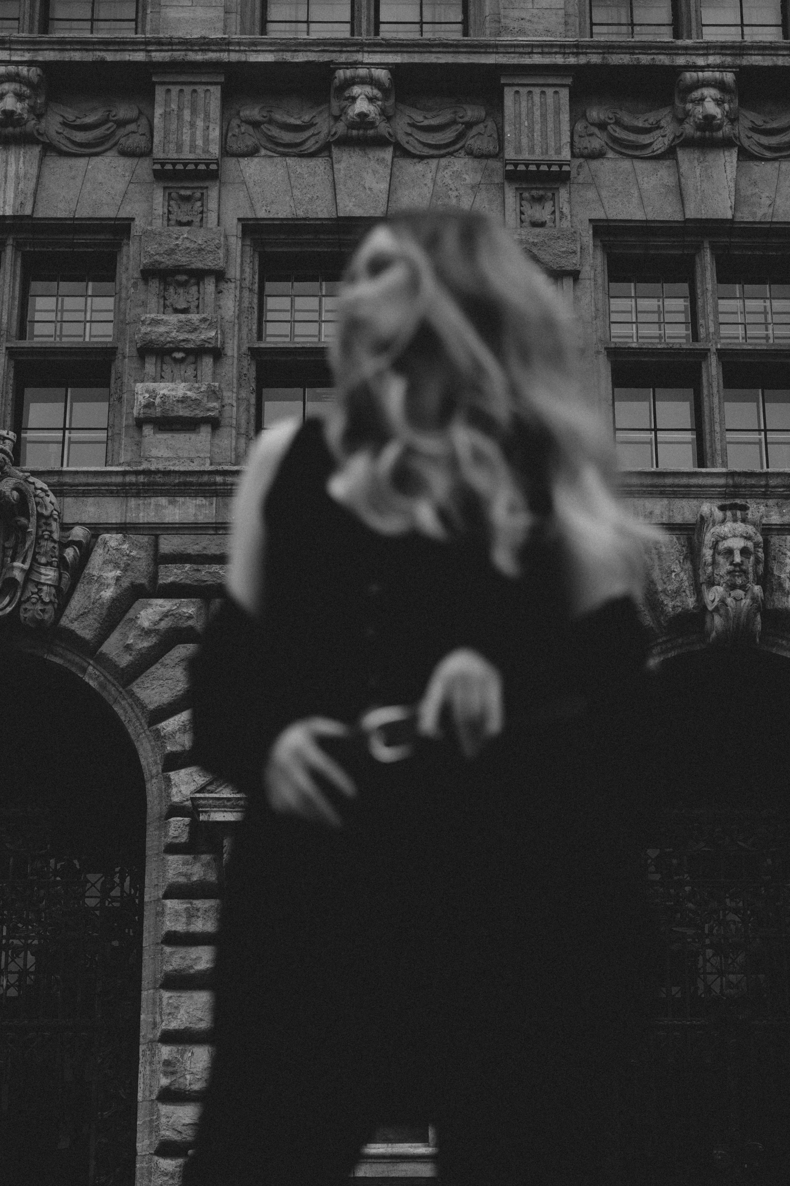 Black&White city walk. Woman in Heels&Black suit. Cinematic Portrait Photography. Kristina Kozheltsova- Soulful Portrait&Lifestyle&Love Story Photographer in Leipzig, Germany