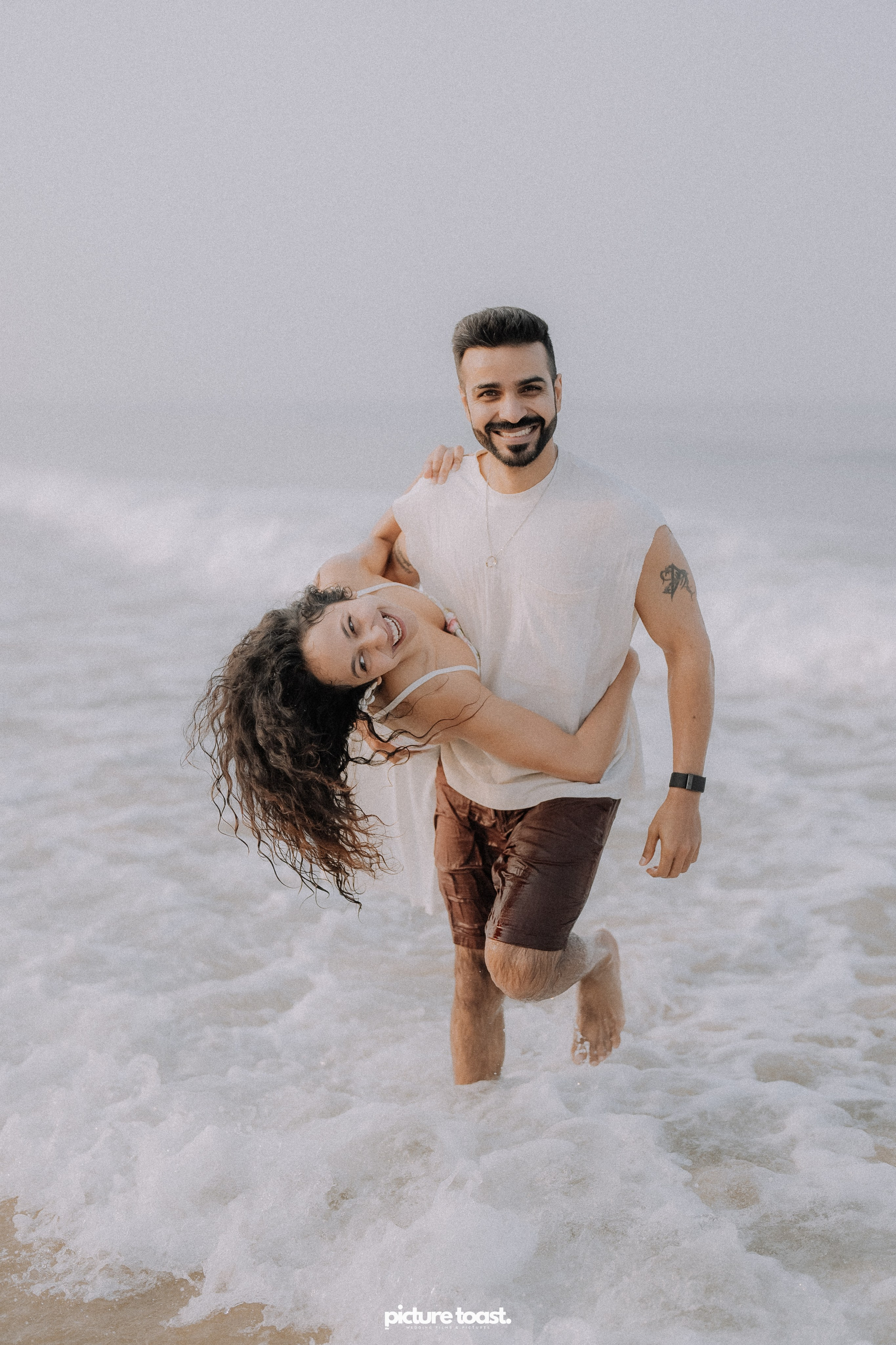 Love In The Beach. Fine art Wedding Photographers in India & Canada