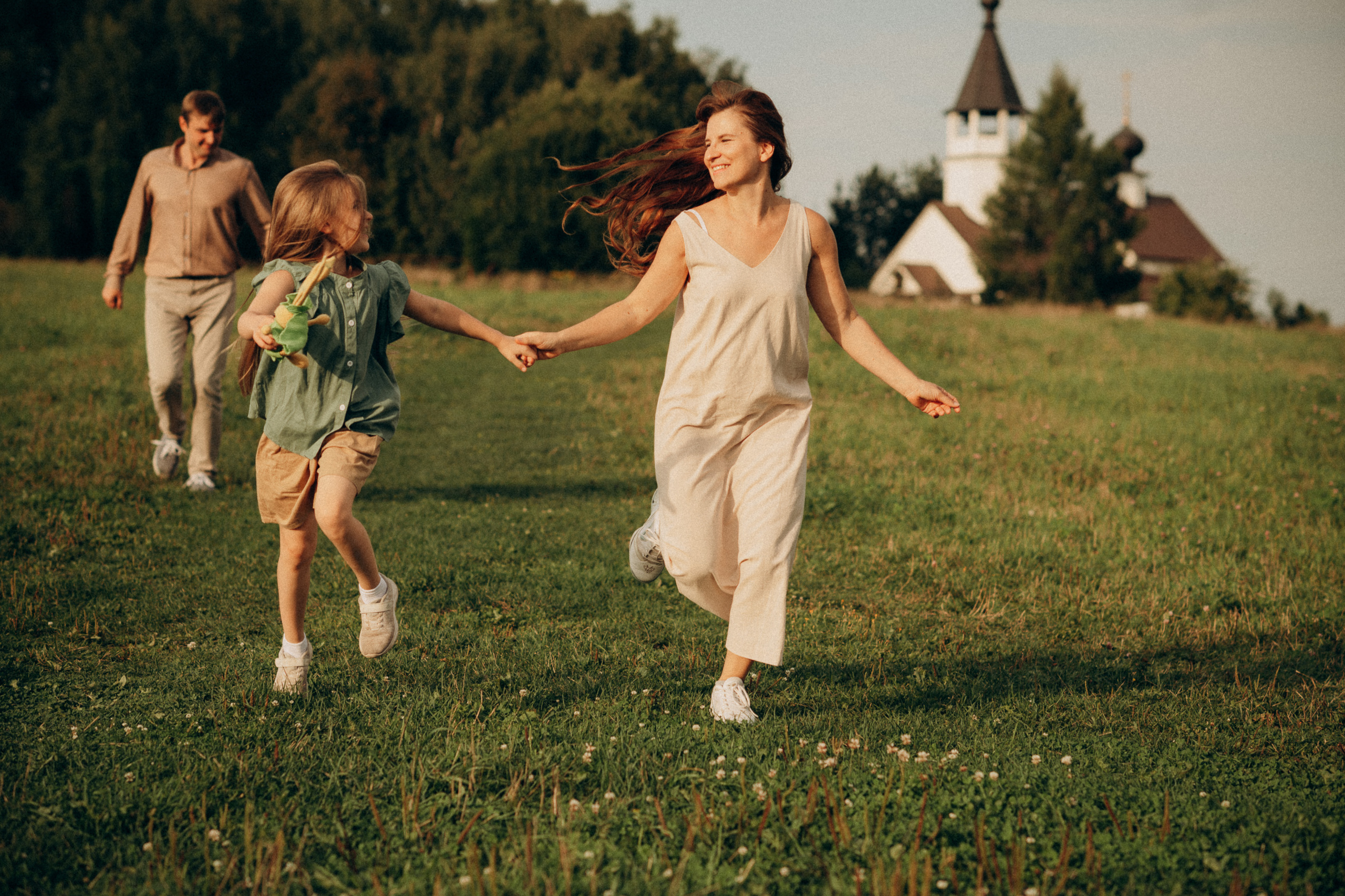 family playing in the park