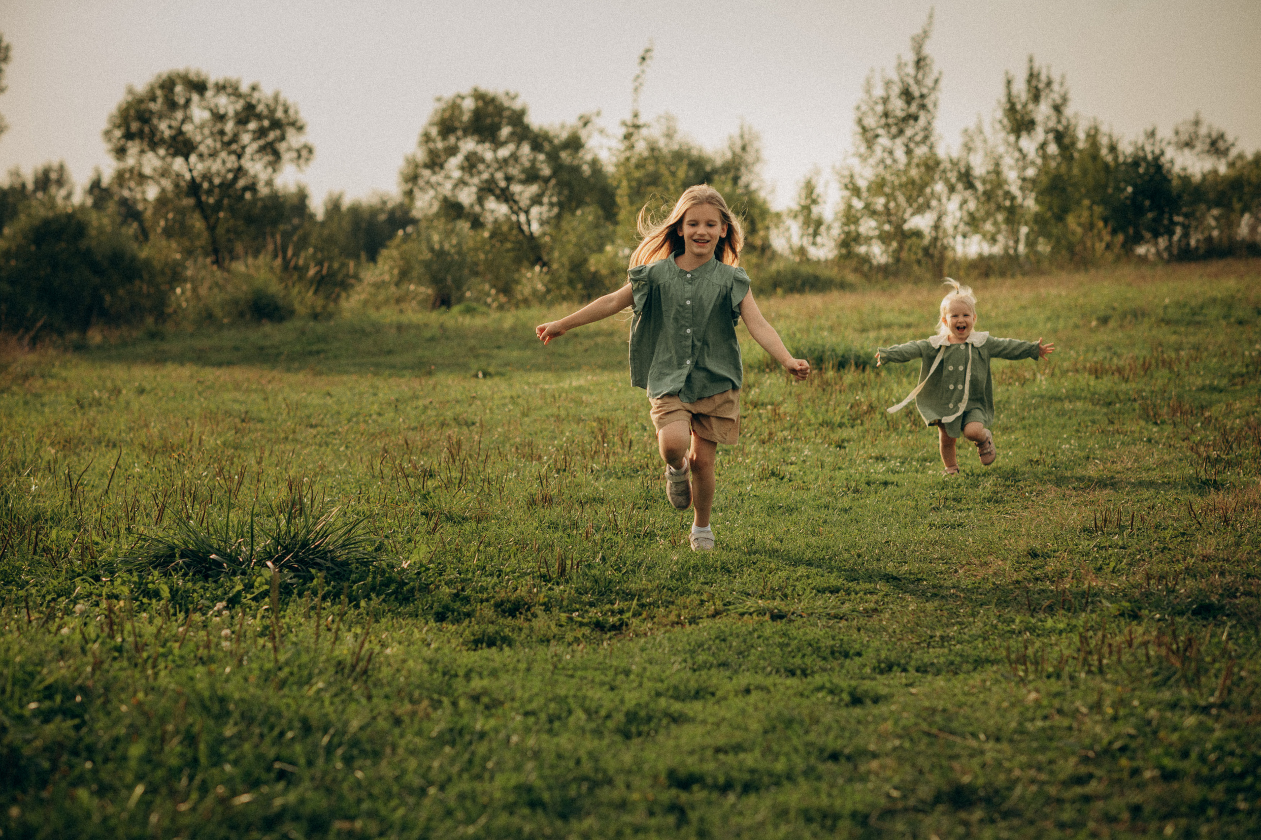 children playing on the grass