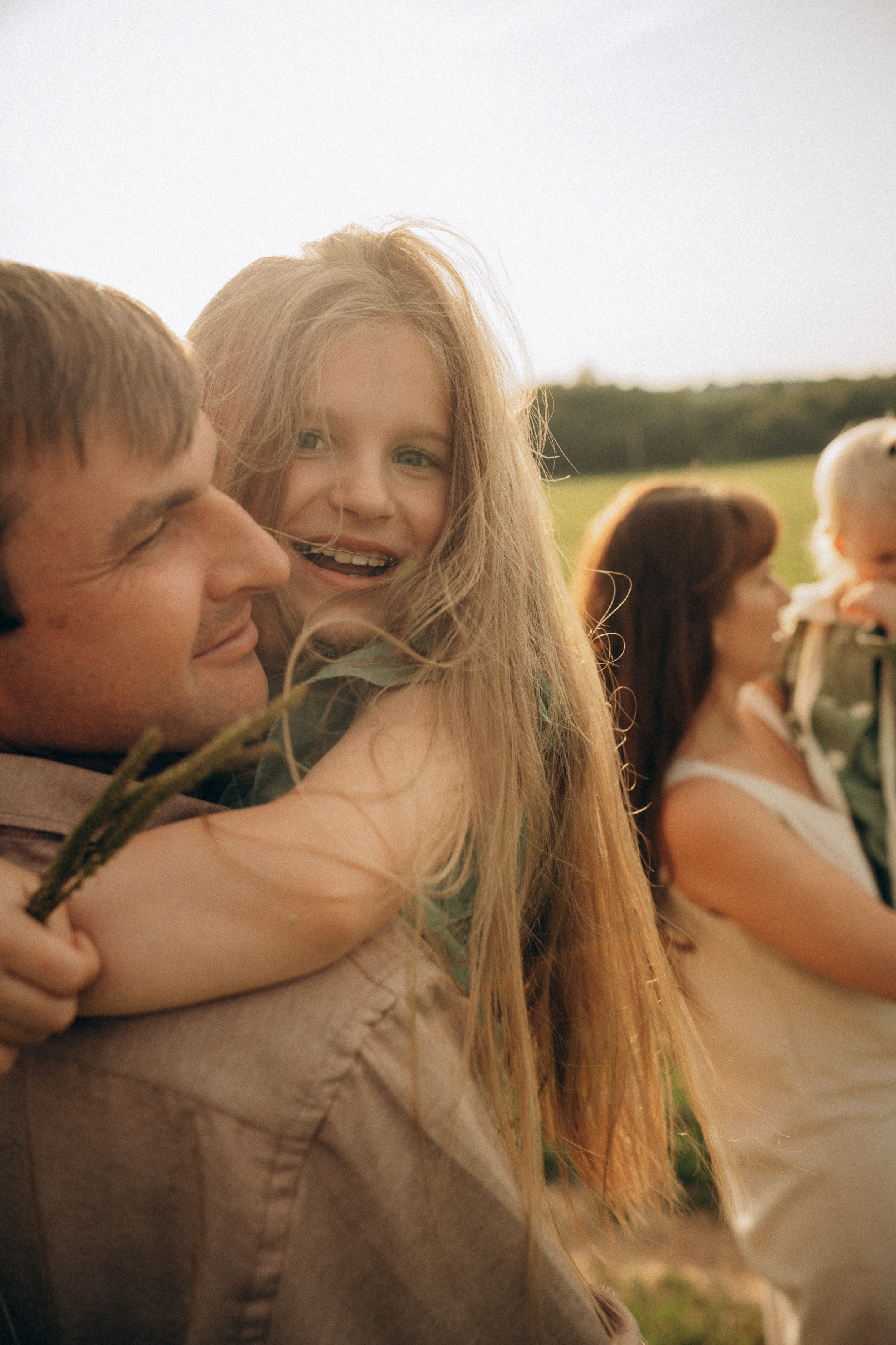 Candid family photoshoot outdoors. Wedding & Family photographer in County Donegal and Dublin, Ireland