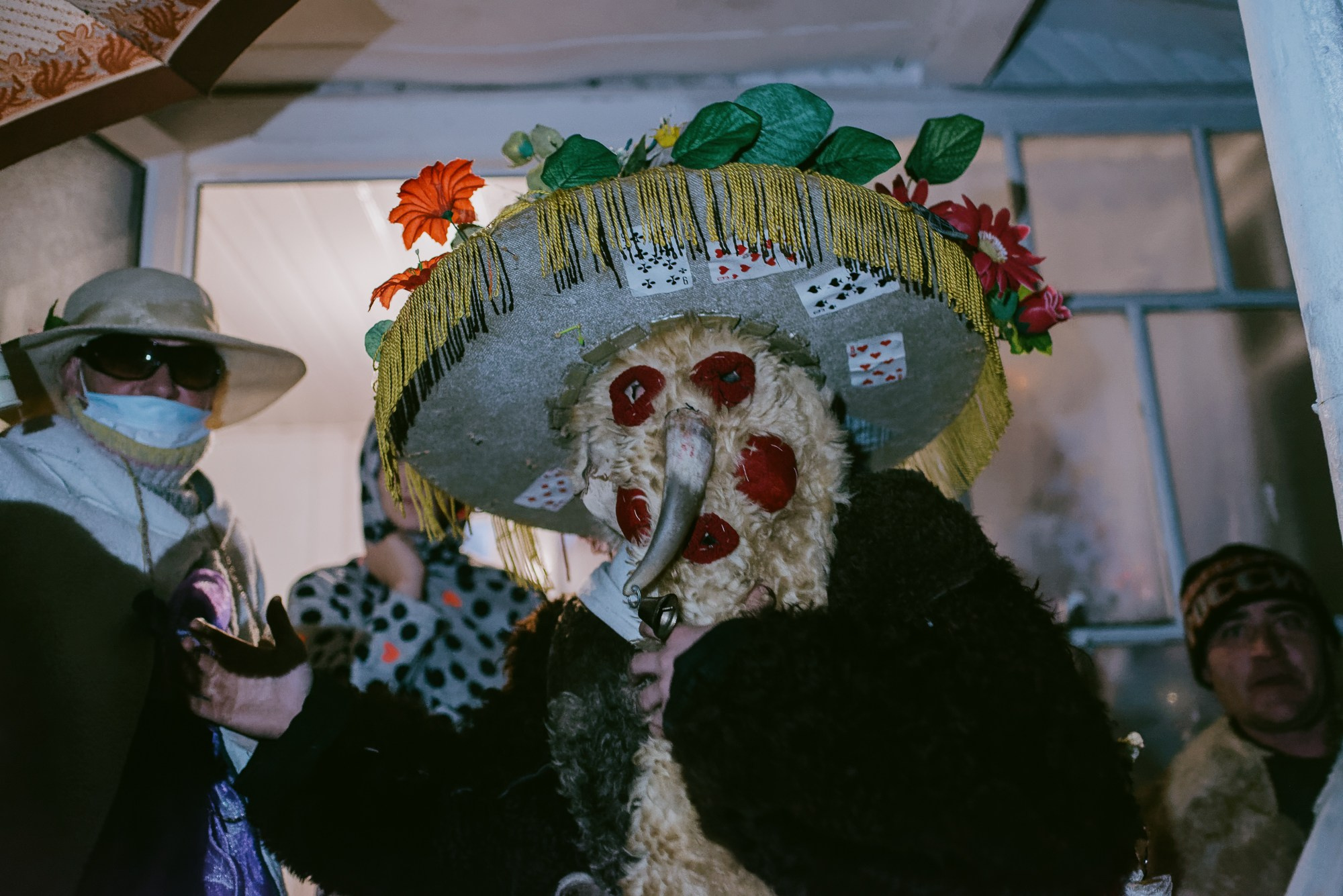 Malanca is a spectacular folk tradition, especially common in the communities of northern Moldova and Bukovina, with deep roots in New Year’s customs. It usually takes place on the night of December 31st to January 1st and marks the transition between years through a blend of folk theater, traditional costumes, music, dance, and humor.Participants – known as malancari – dress up as symbolic characters, often inspired by mythology, history, or rural life: death, the soldier, the bride, the bear, the gypsy, the devil, the old man, and many more. They go from house to house or take part in organized village parades, accompanied by drums, flutes, and distinctive sounds. The message behind it is to chase away evil and attract good fortune, fertility, and abundance in the new year.In some areas, Malanca has evolved into a true display of folk art, with groups preparing costumes, scripts, and music months in advance. It is an authentic way of preserving cultural identity and celebrating community spirit.