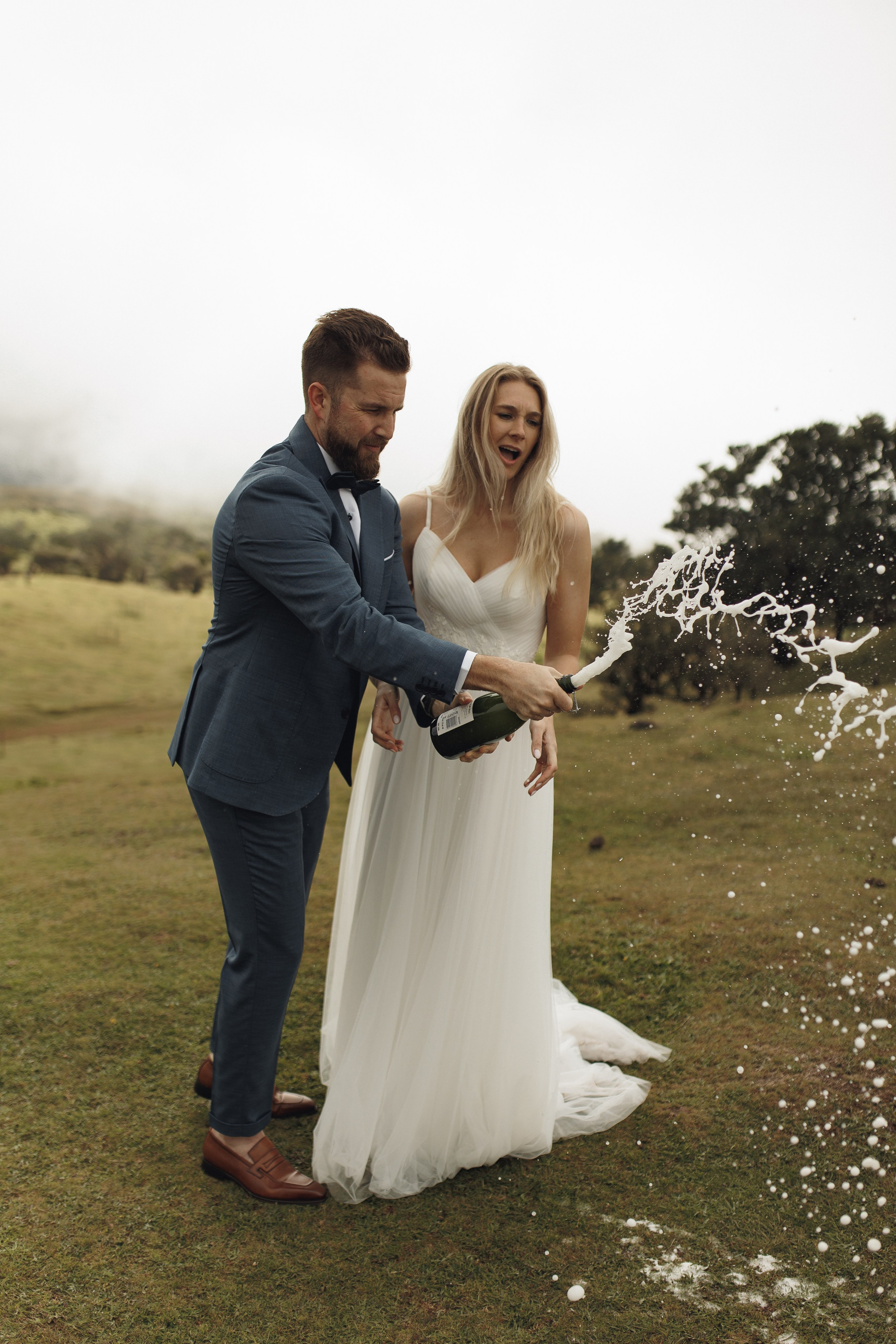 Bride and groom exchange vows in the enchanting Fanal Forest Madeira