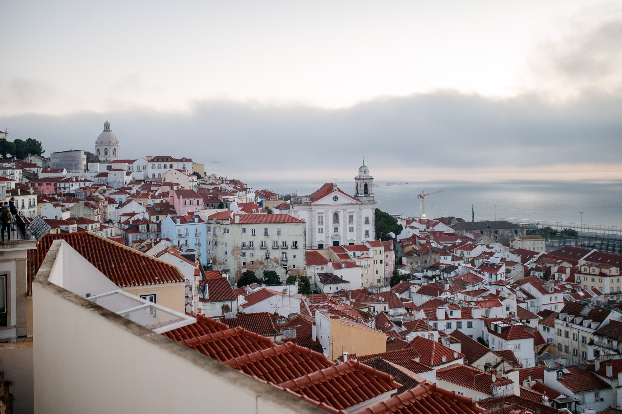 Alfama and Praça do Comércio are two iconic locations for photo shoots in Lisbon