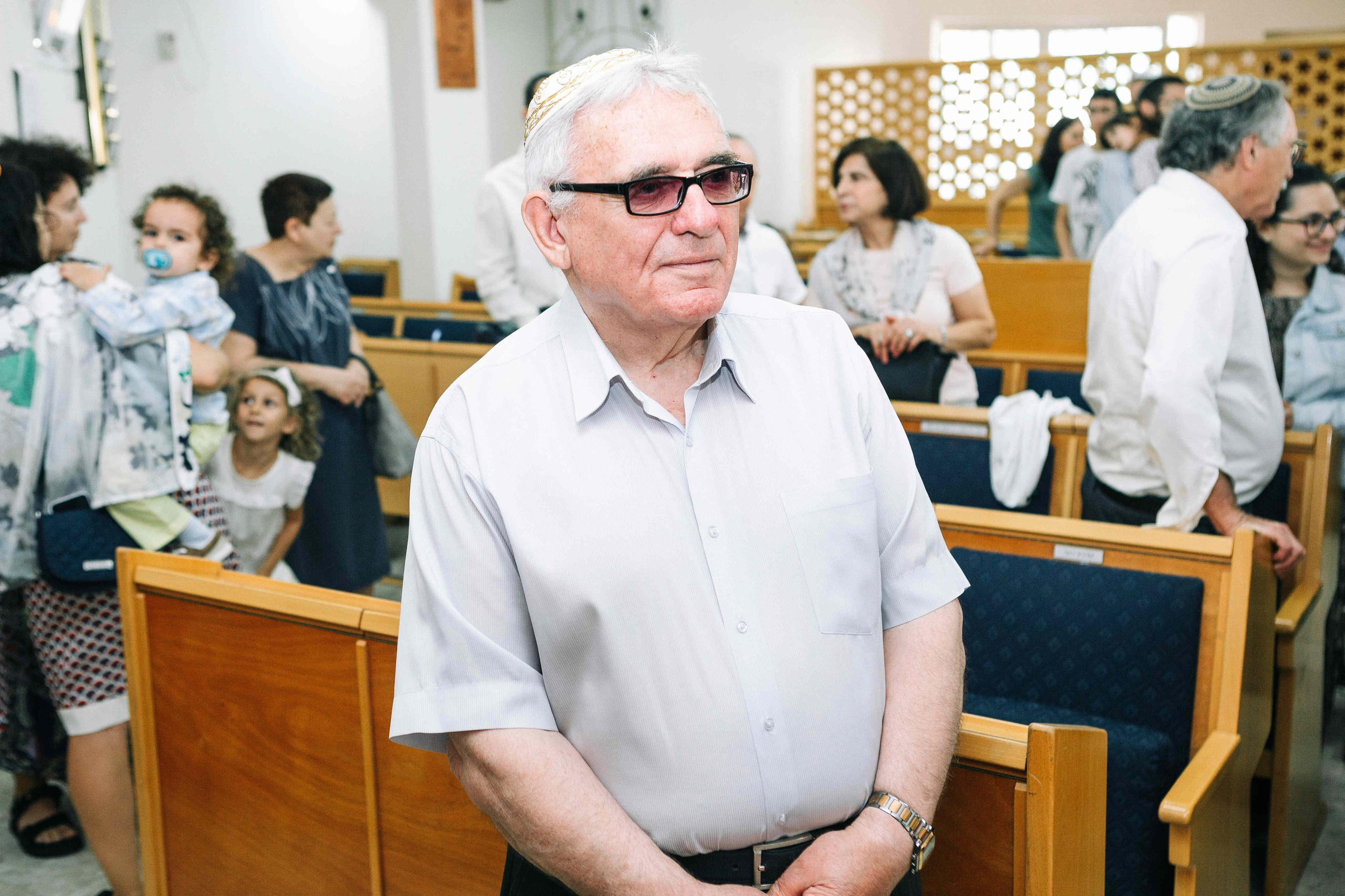 BRITH MILA IN THE SMALL SYNAGOGUE. PHOTOGRAPHER IN ISRAEL