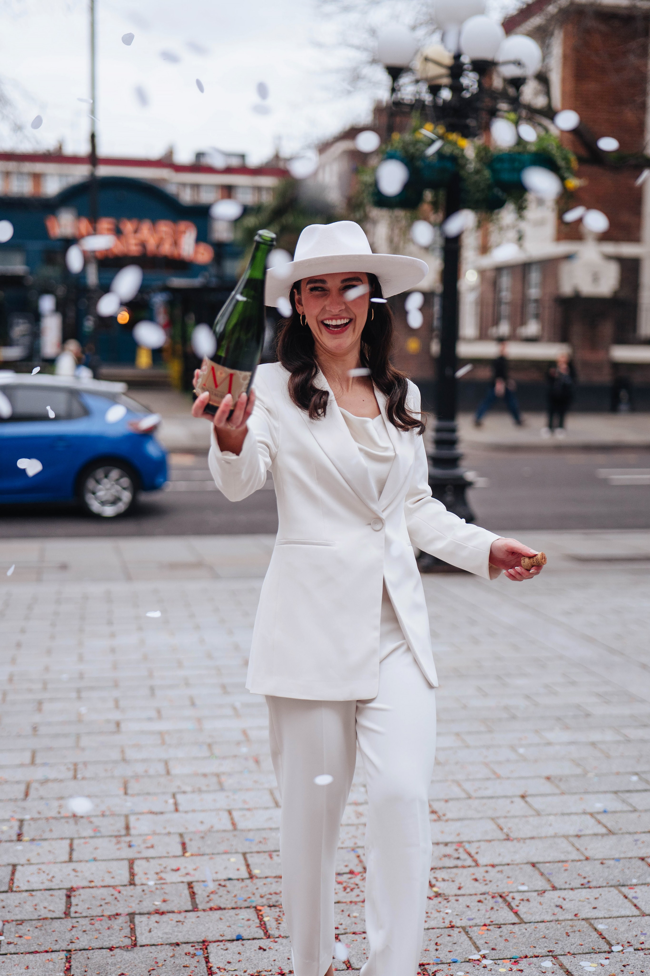 Exit from Islington town hall, champagne bottle opening 