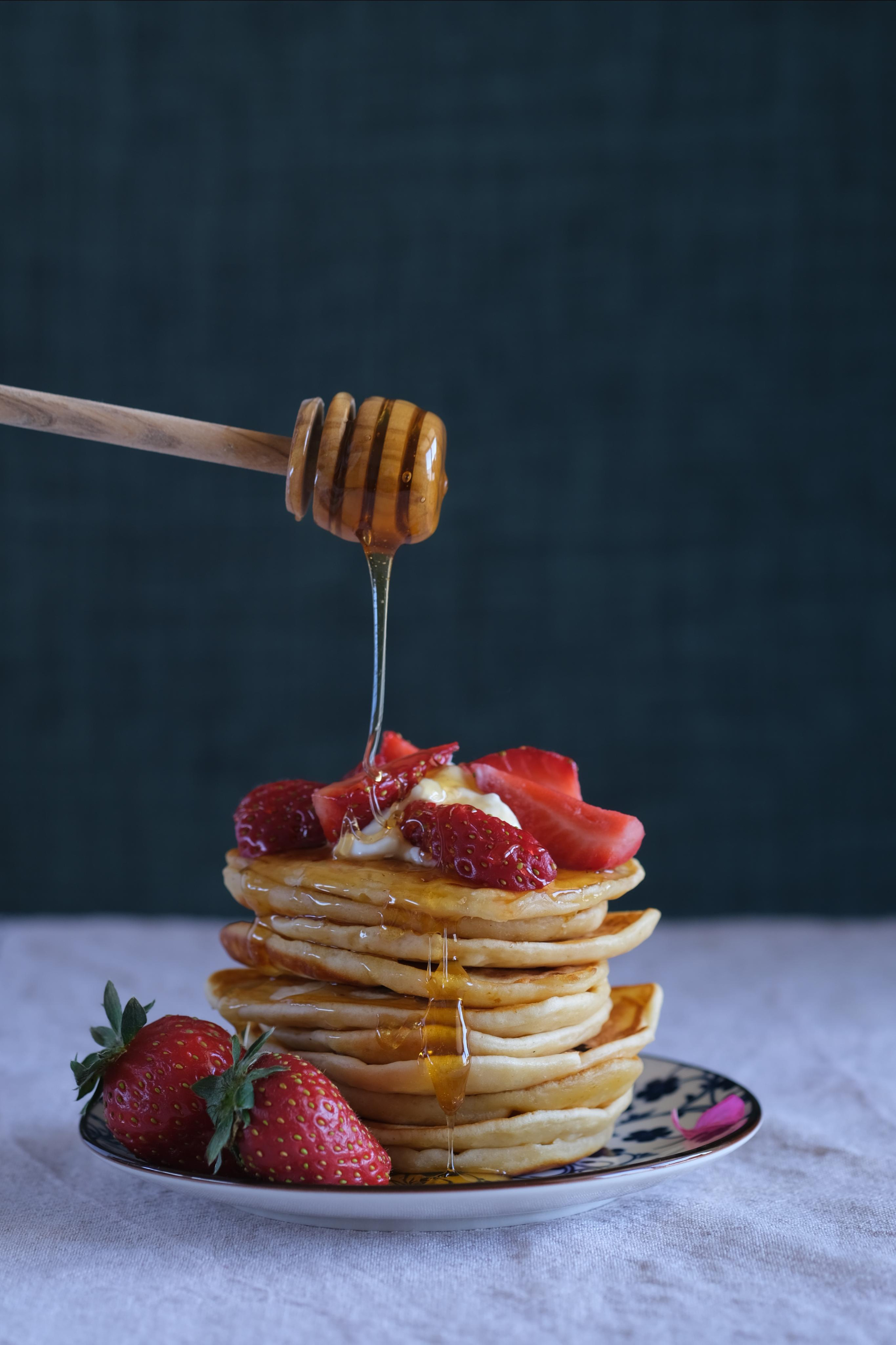 pancakes with strawberries and honey
