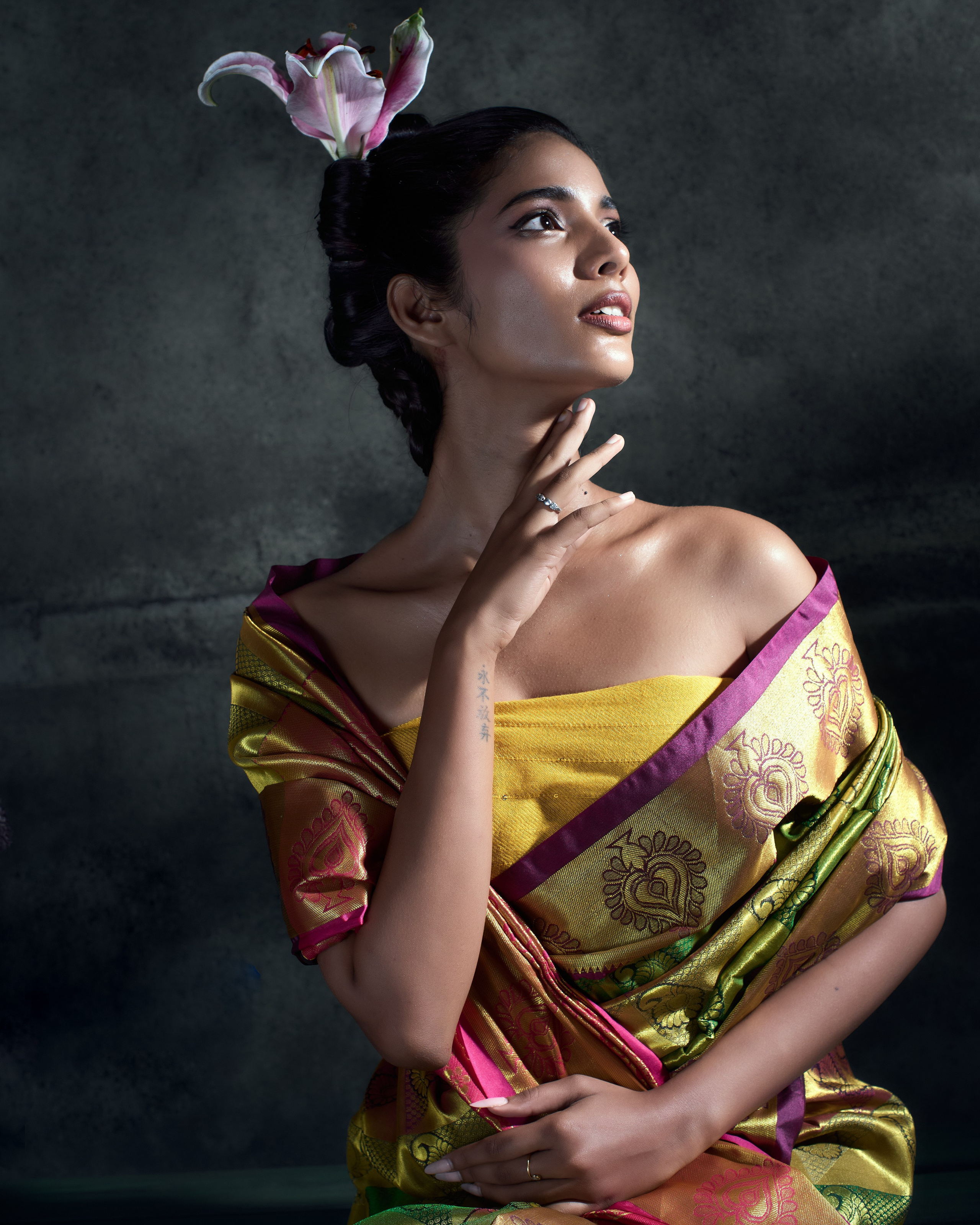 Fashion Portrait shot in a studio with Saree and flowers in Chennai