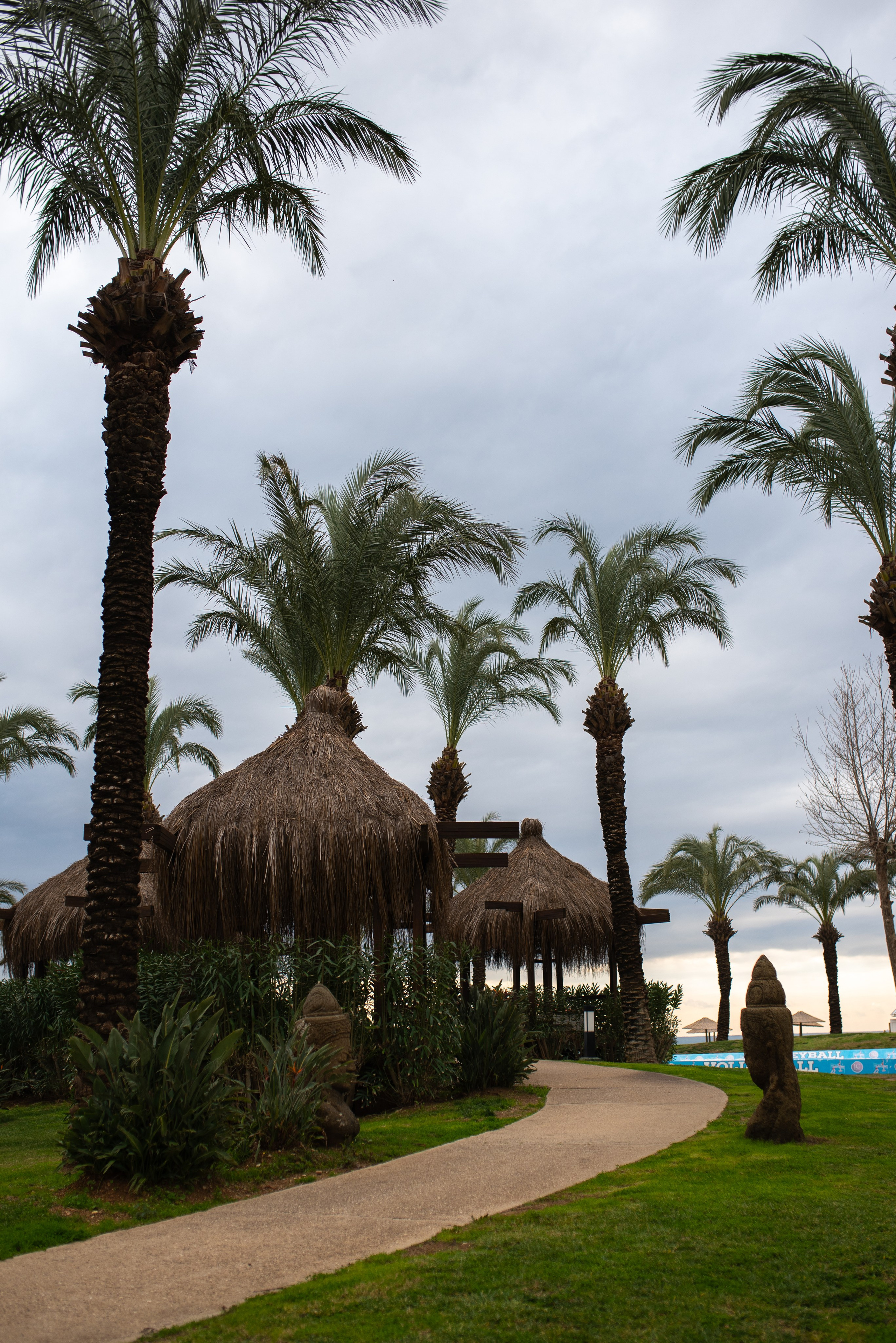 Green garden area at IC Hotels Green Palace in Antalya, luxury family hotel photographyby a professional photographer.