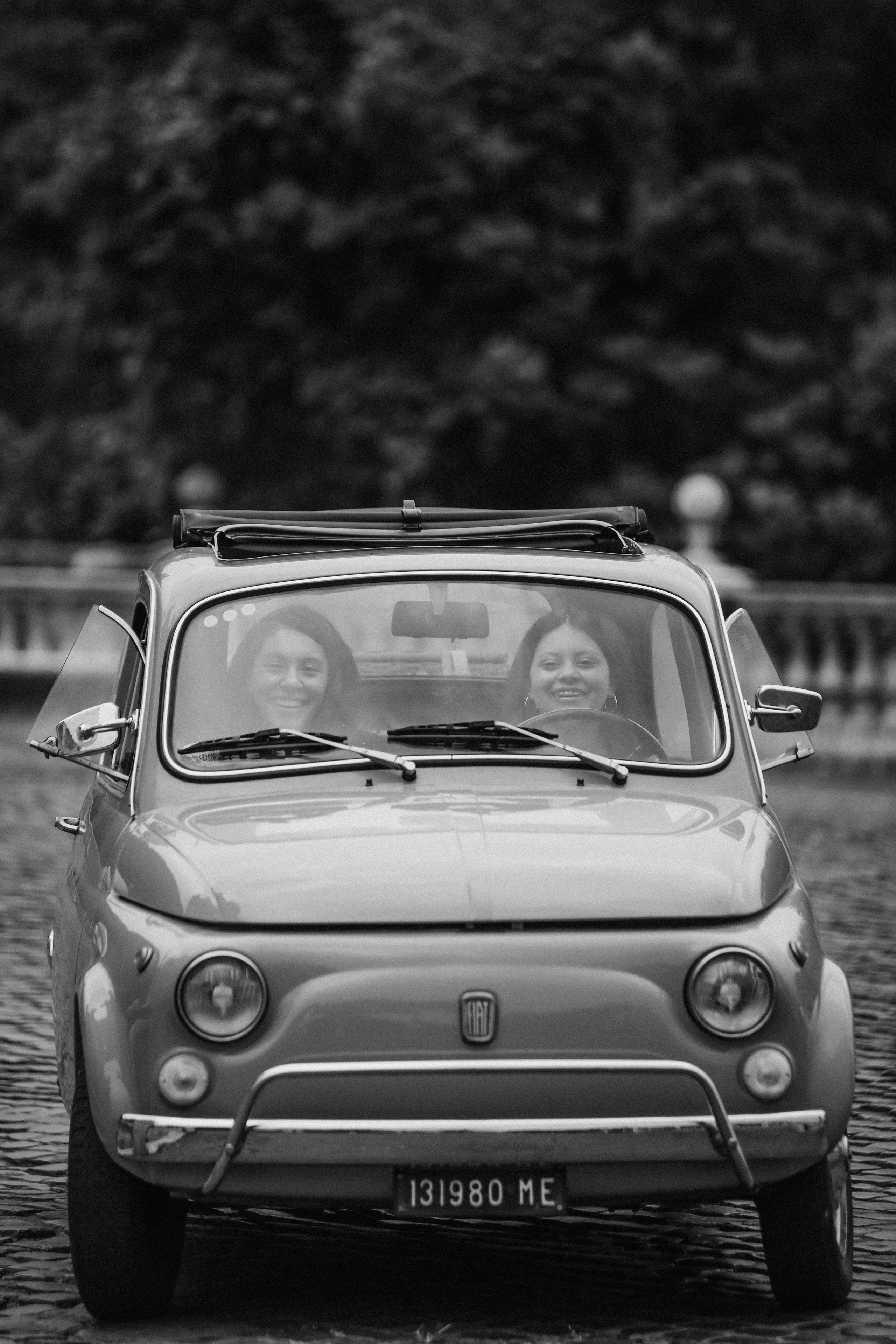 Fiat 500 and Vespa. Photographer in Rome