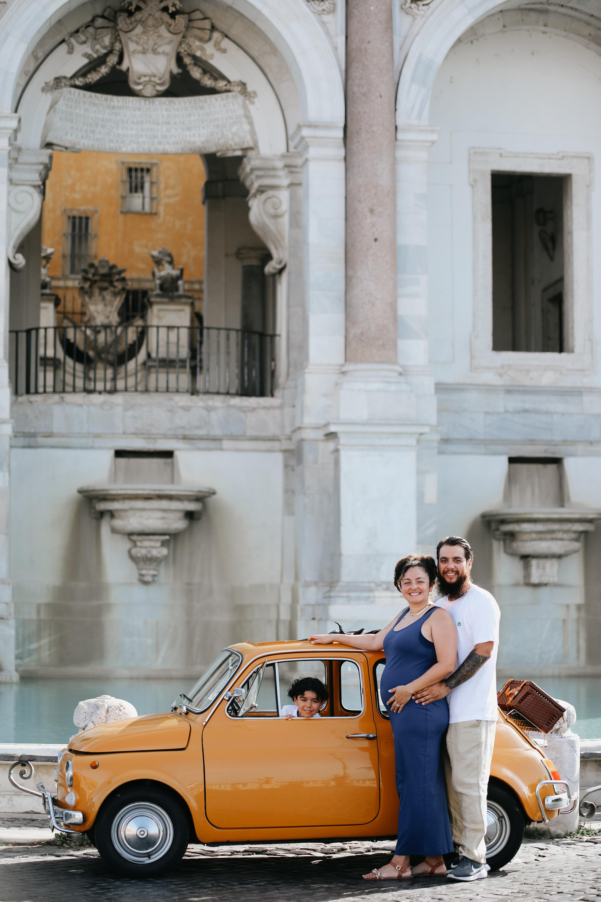 Fiat 500 and Vespa. Photographer in Rome