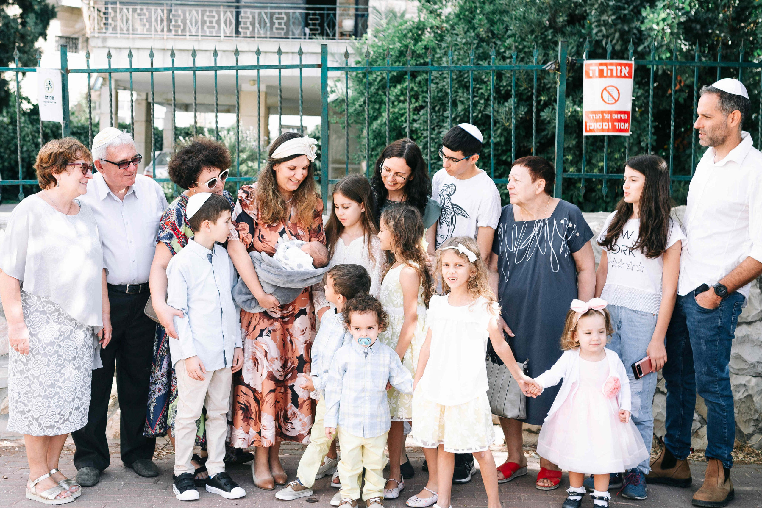 BRITH MILA IN THE SMALL SYNAGOGUE. PHOTOGRAPHER IN ISRAEL