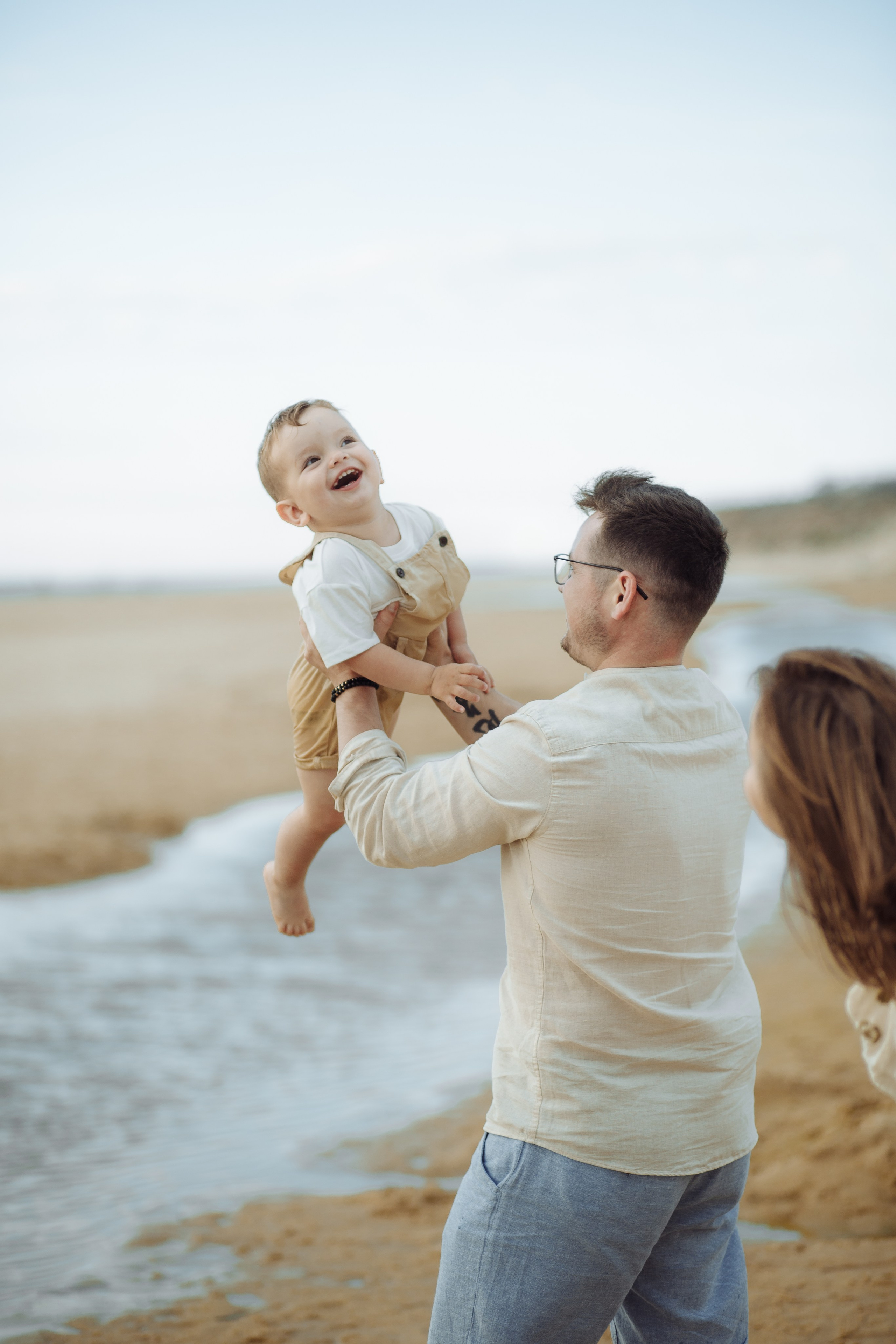 Father playing with child at Dune du Pilat
