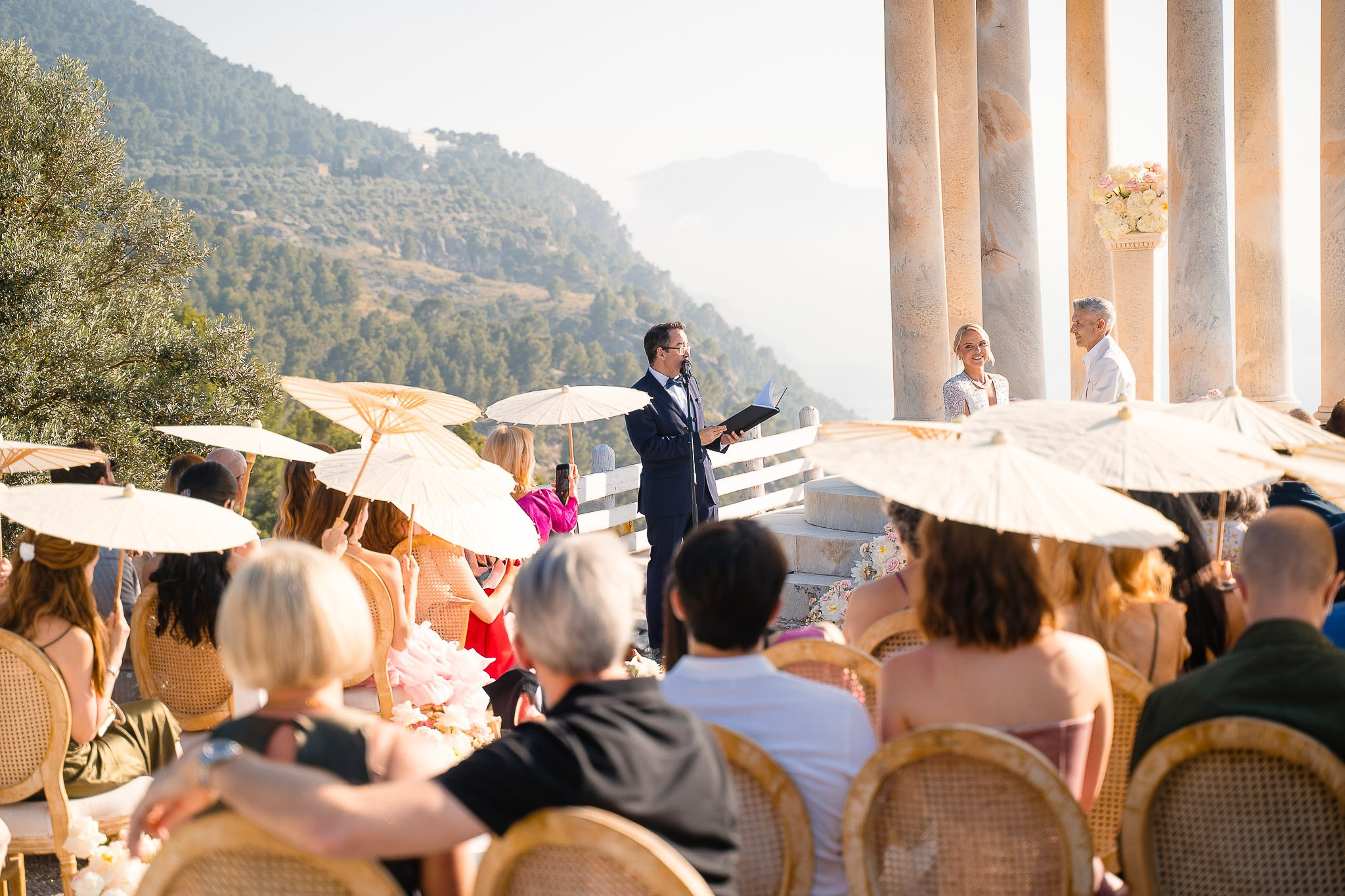 Officiant leading ceremony at Son Marroig temple Mallorca
