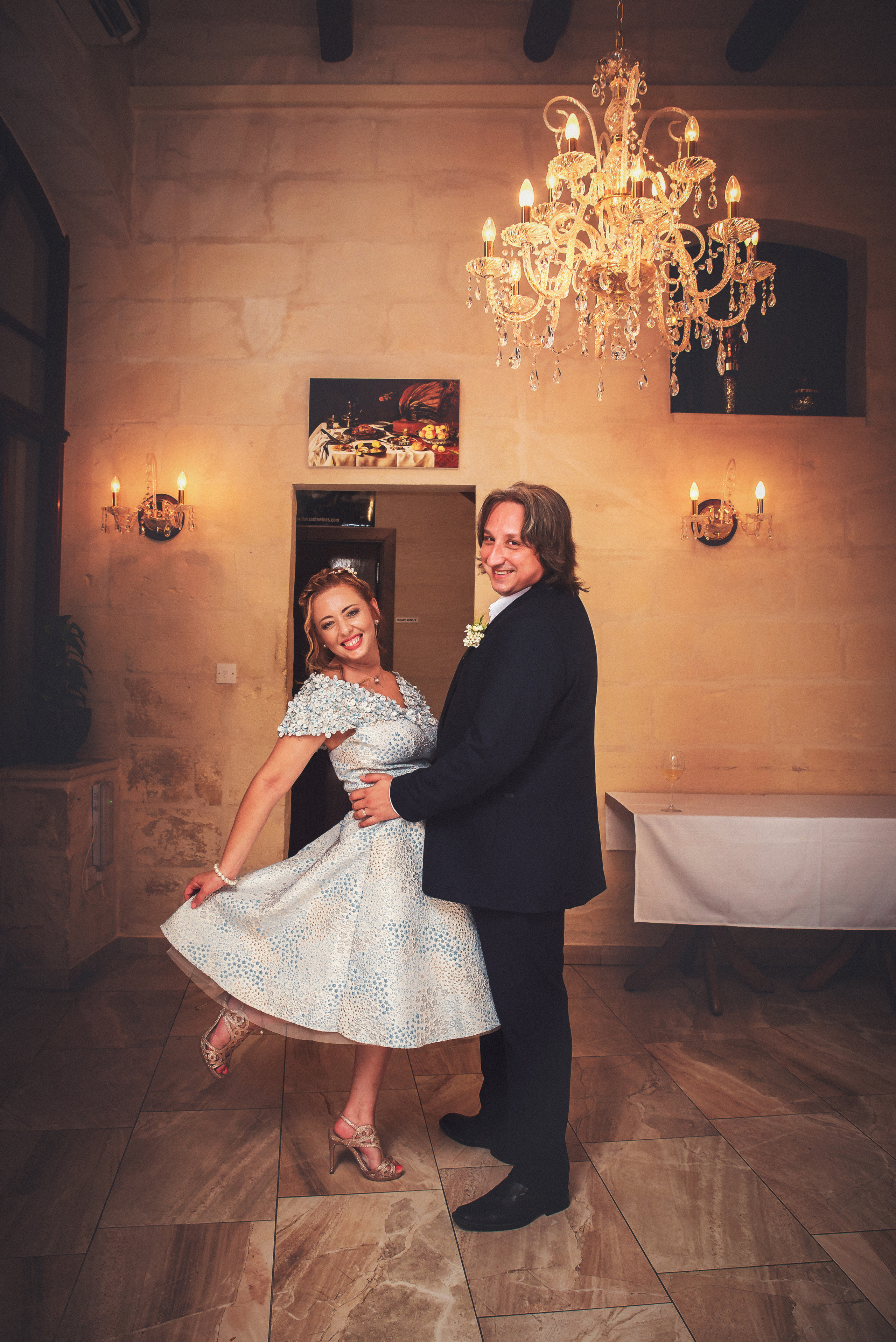 bride and groom dancing