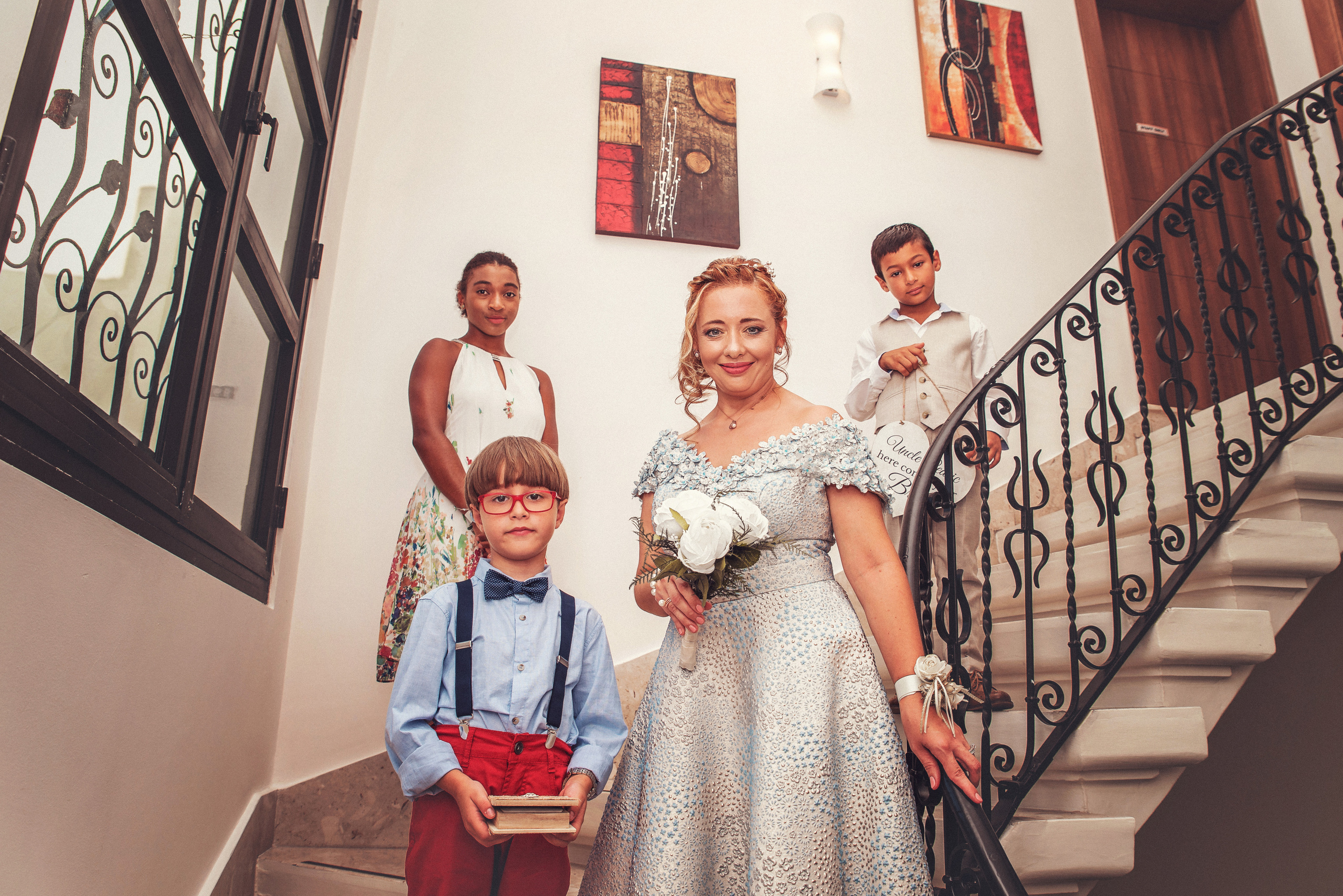 boy carries rings for newlyweds