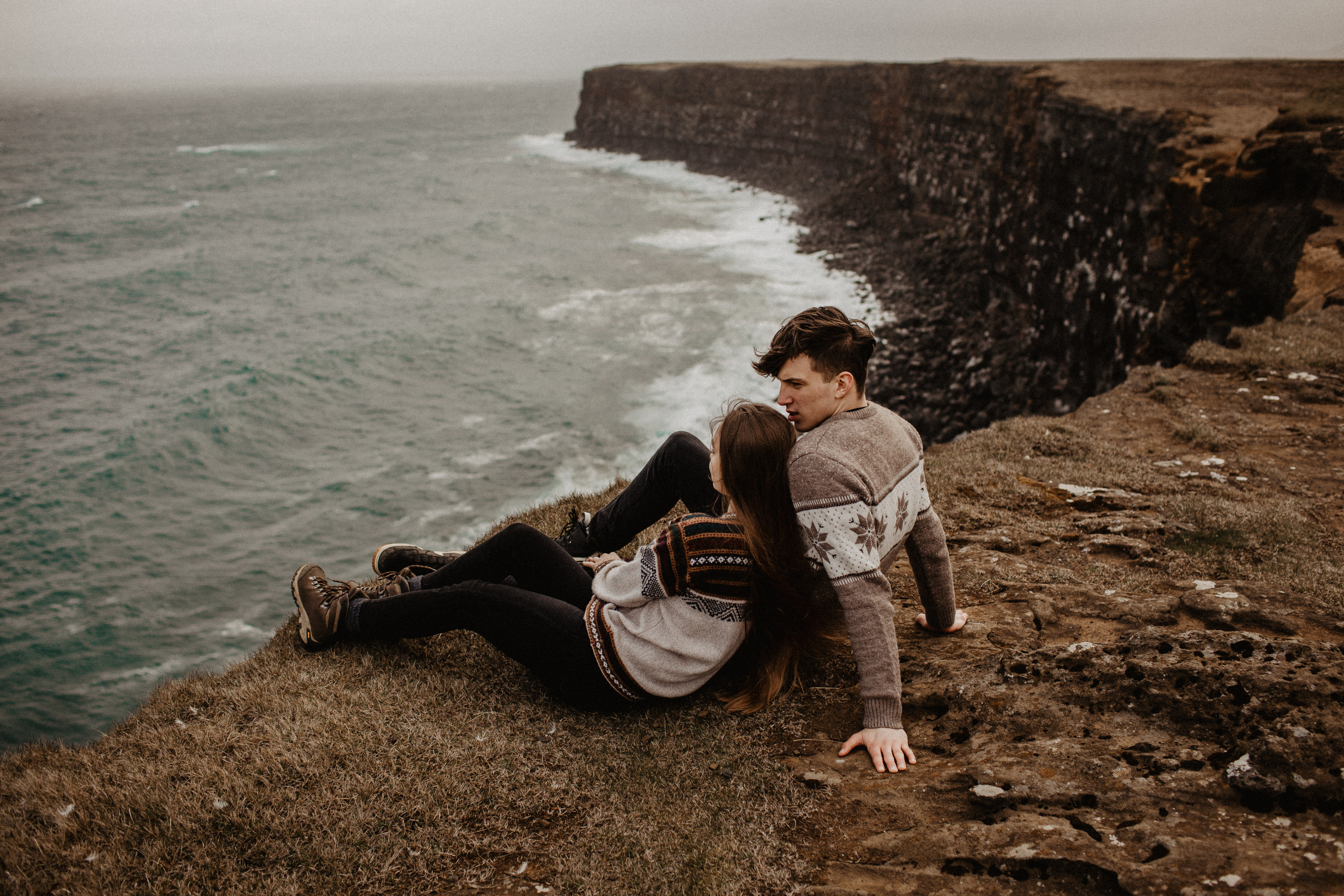 Couple photoshoot in front of volcano eruption in Iceland. Iceland elopement photographer & videographer