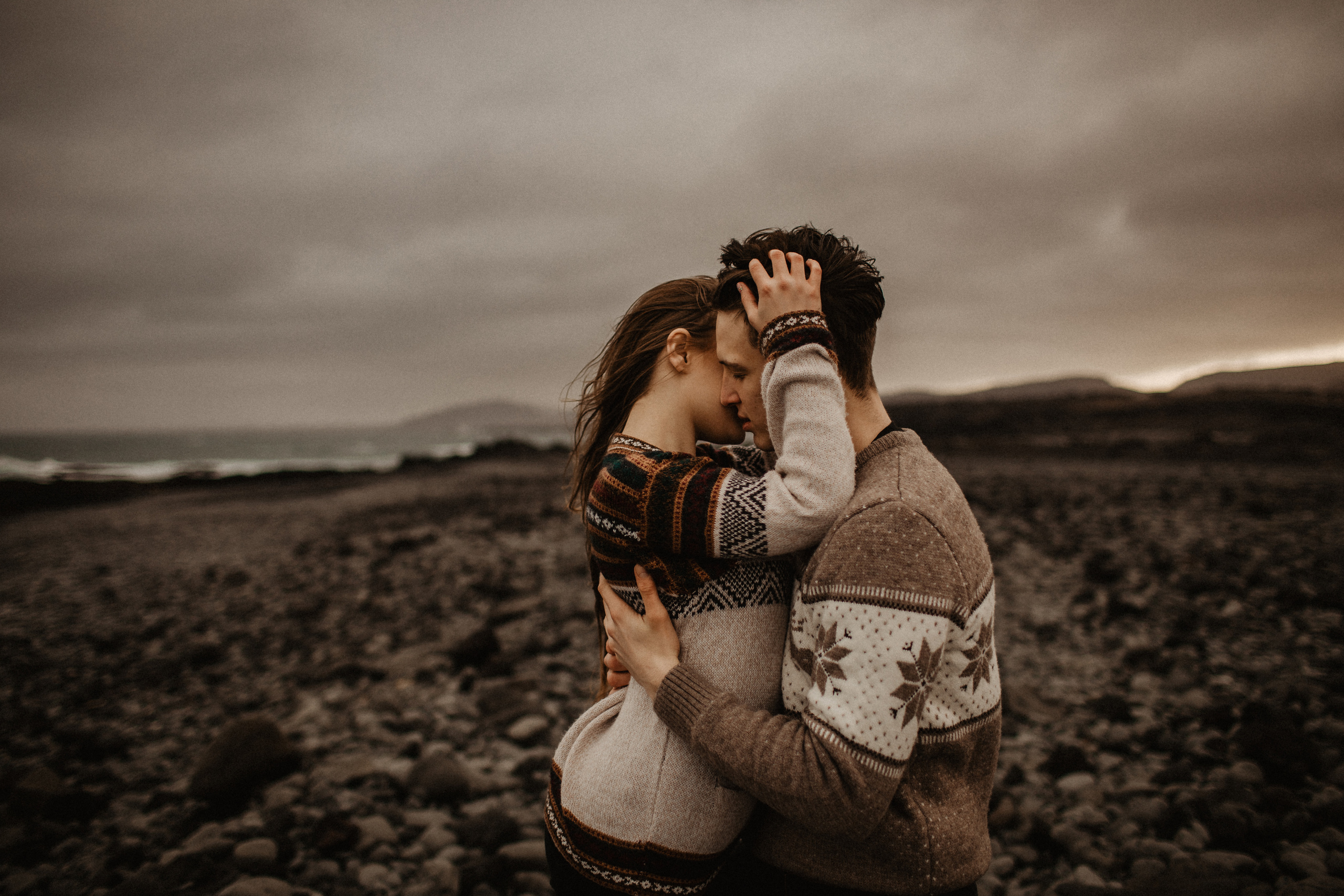 Couple photoshoot in front of volcano eruption in Iceland. Iceland elopement photographer & videographer