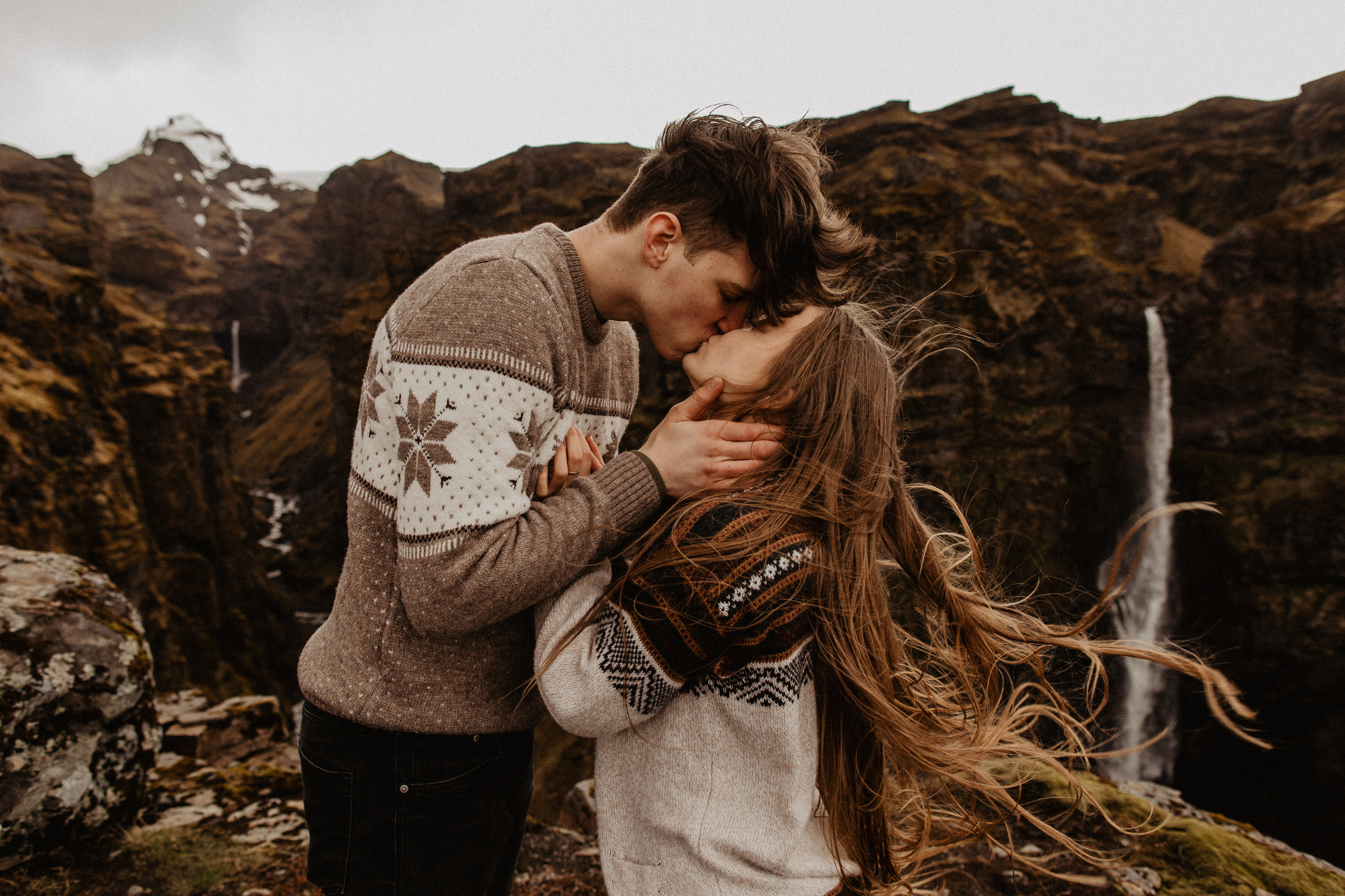 Couple photoshoot in front of volcano eruption in Iceland. Iceland elopement photographer & videographer
