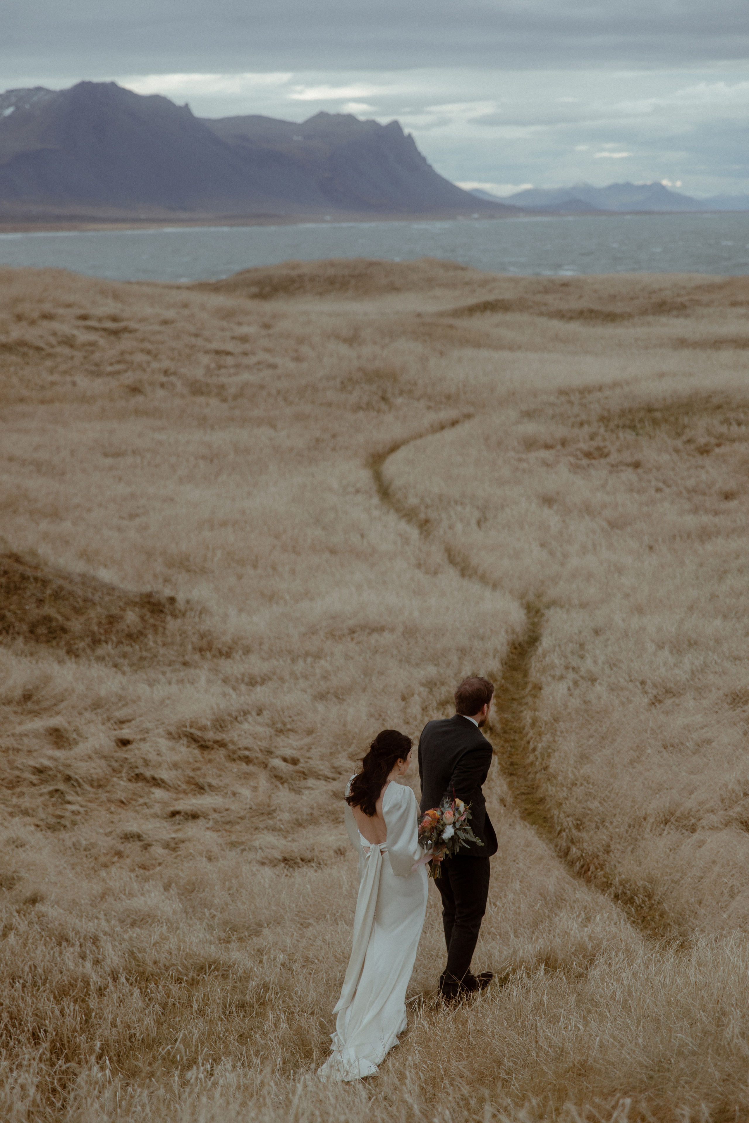 Elopement at Snaefellsnes Iceland | Wedding photos with Icelandic horses. Iceland elopement photographer & videographer
