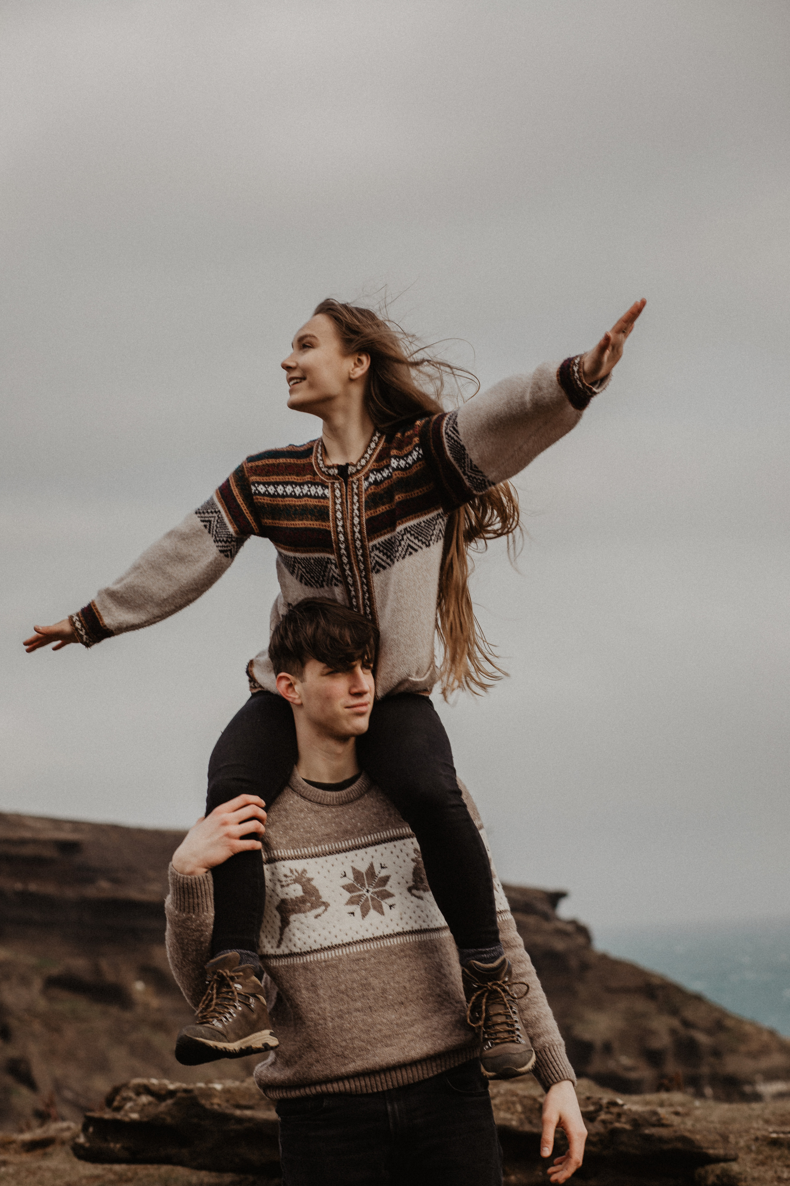 Couple photoshoot in front of volcano eruption in Iceland. Iceland elopement photographer & videographer