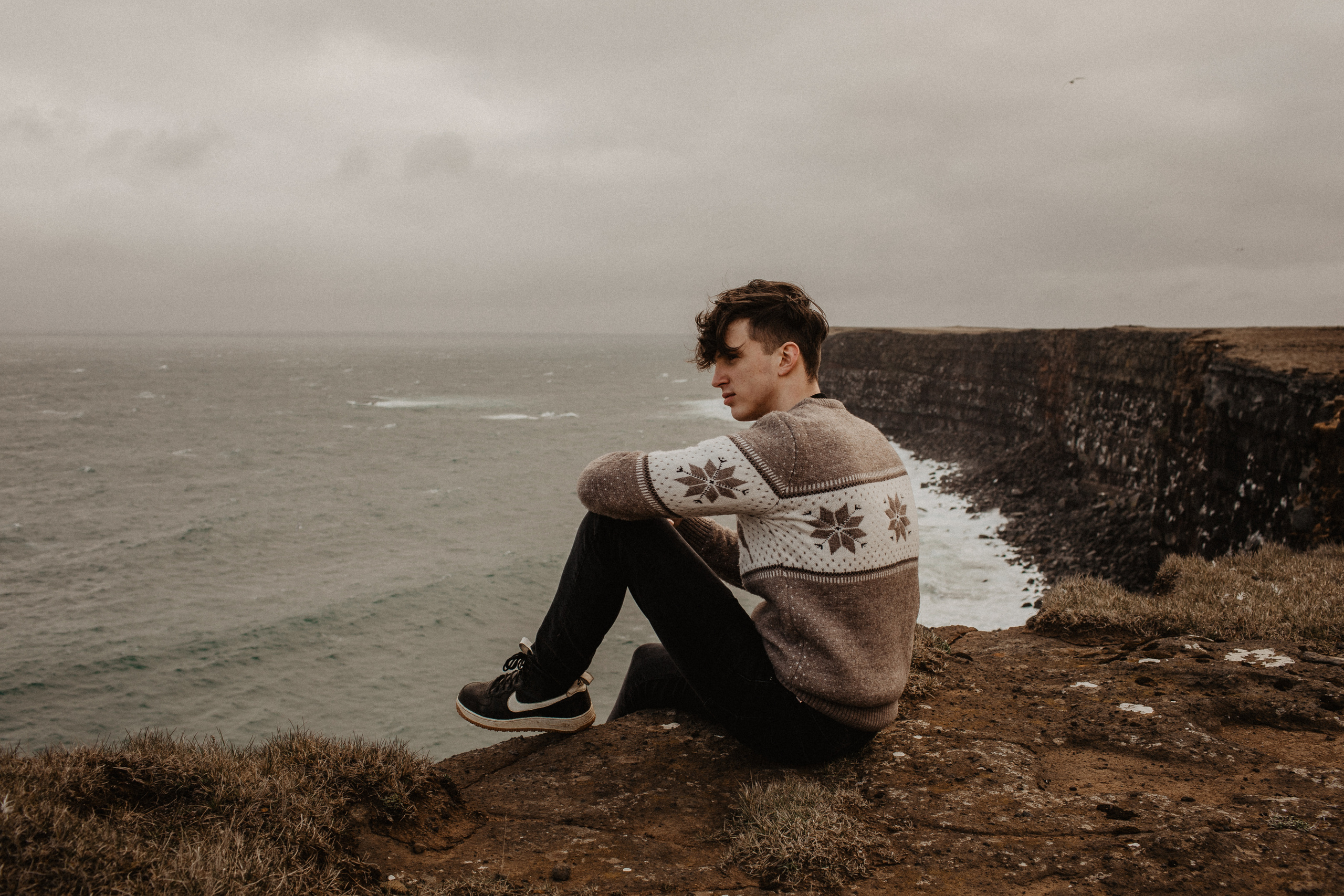 Couple photoshoot in front of volcano eruption in Iceland. Iceland elopement photographer & videographer
