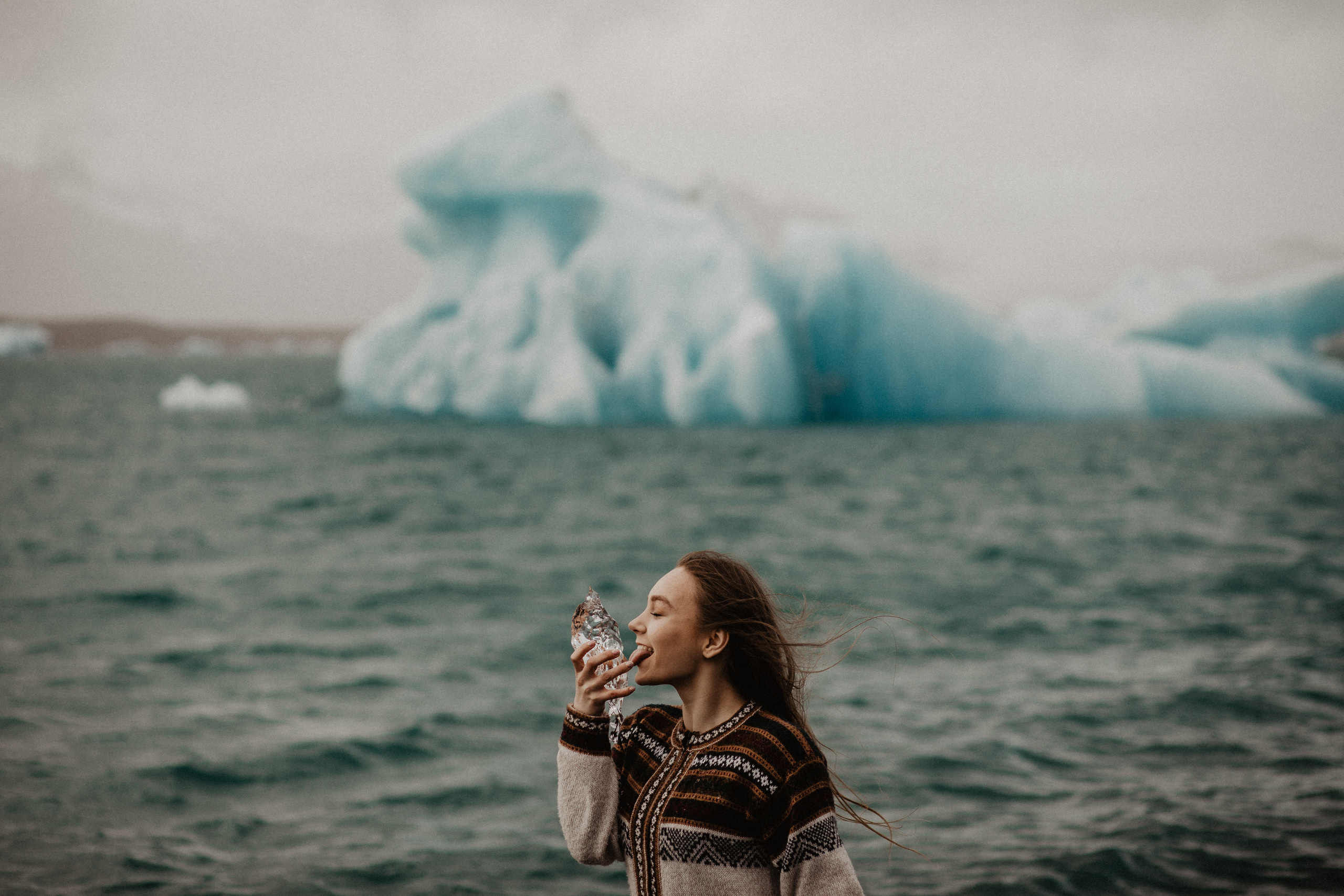 Couple photoshoot in front of volcano eruption in Iceland. Iceland elopement photographer & videographer