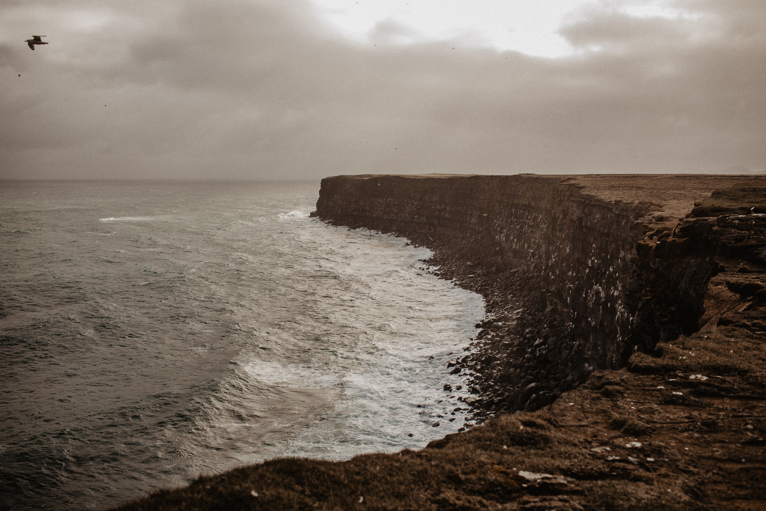 Couple photoshoot in front of volcano eruption in Iceland. Iceland elopement photographer & videographer