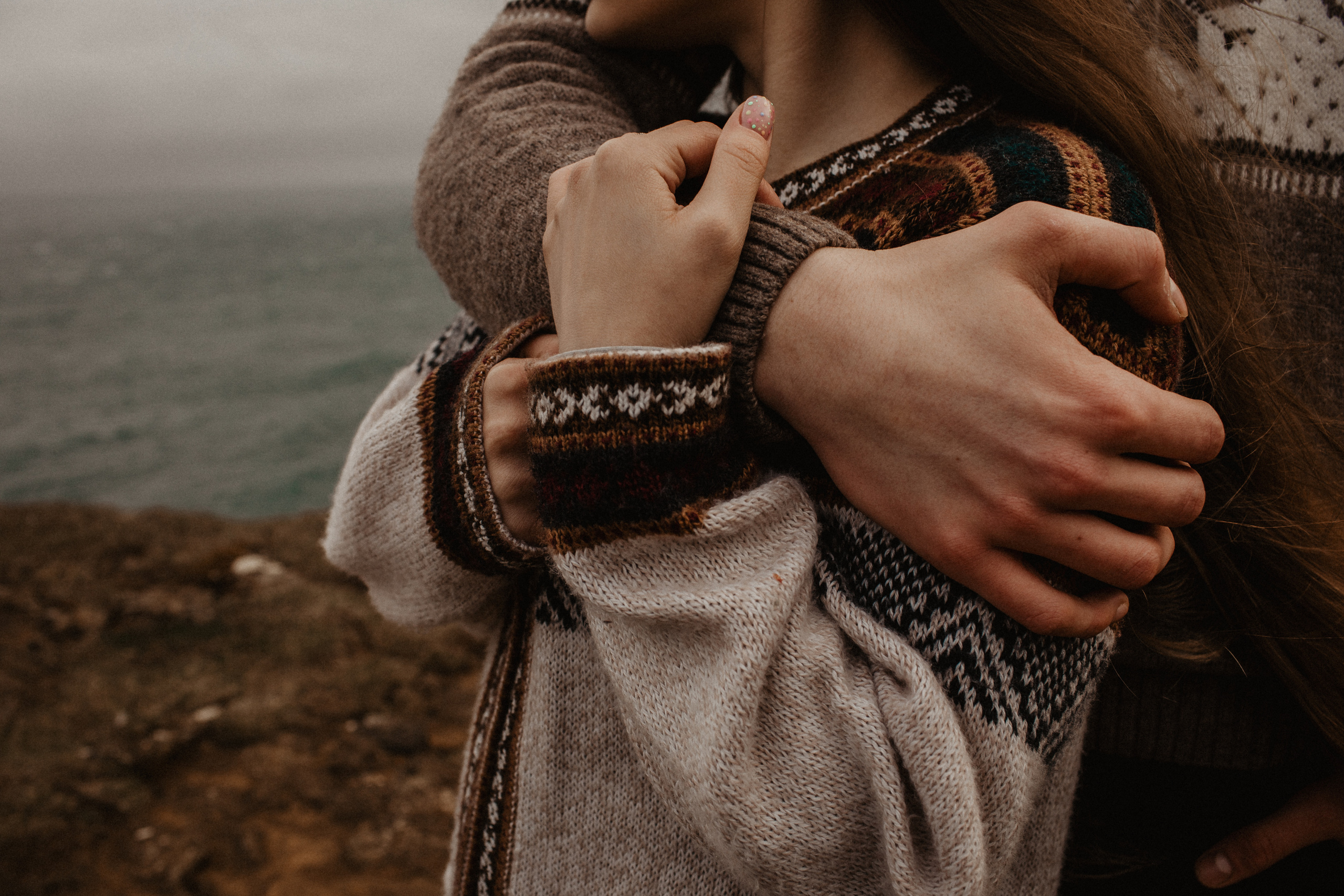 Couple photoshoot in front of volcano eruption in Iceland. Iceland elopement photographer & videographer