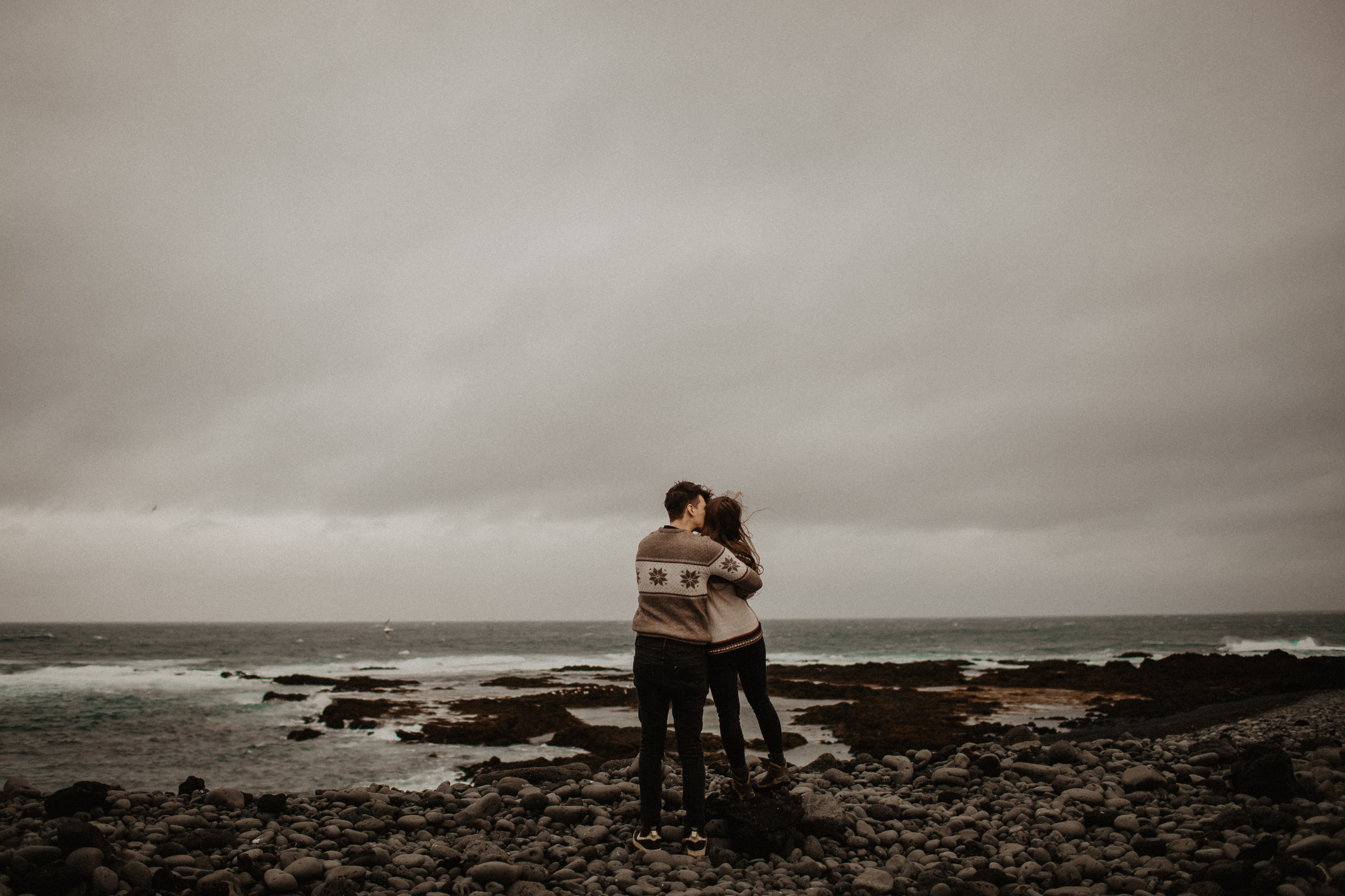 Couple photoshoot in front of volcano eruption in Iceland. Iceland elopement photographer & videographer