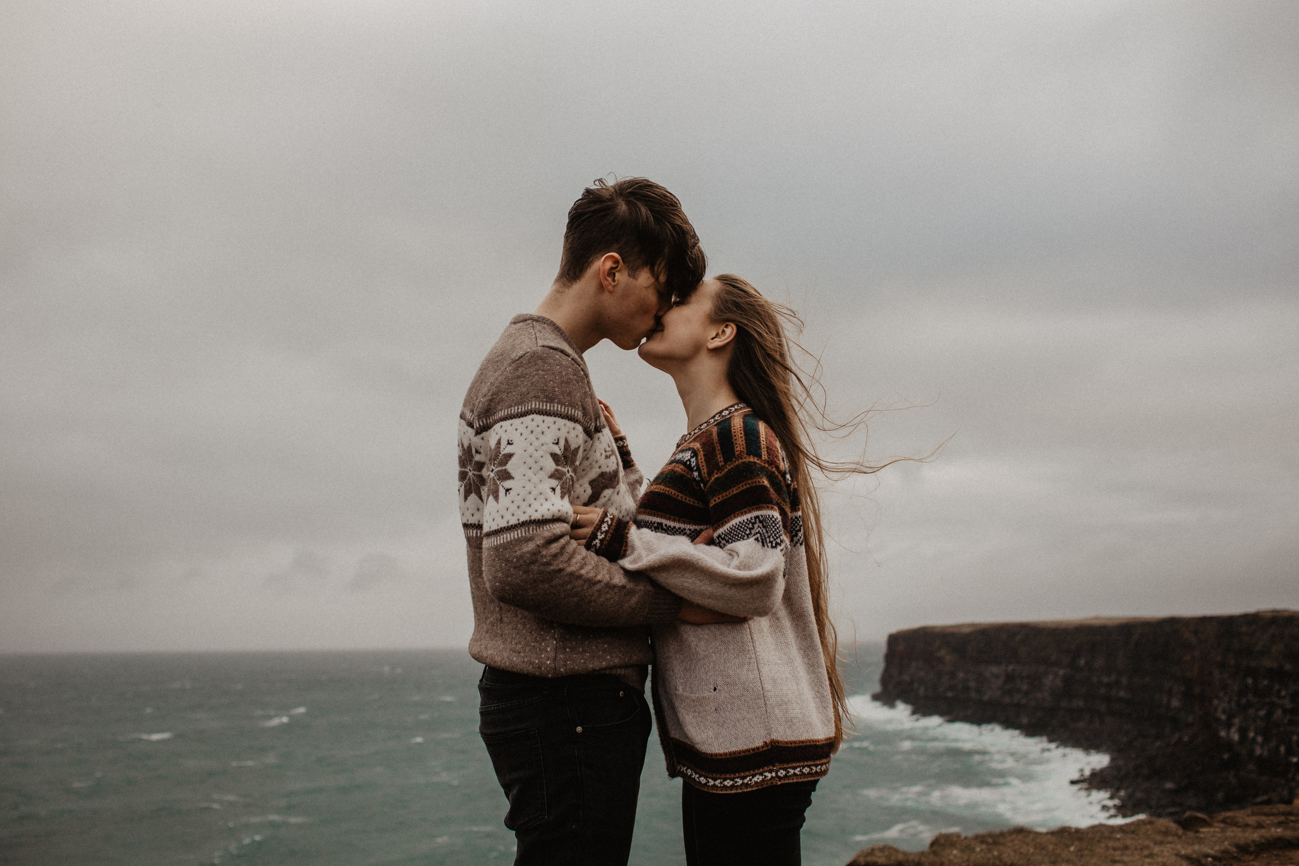 Couple photoshoot in front of volcano eruption in Iceland. Iceland elopement photographer & videographer