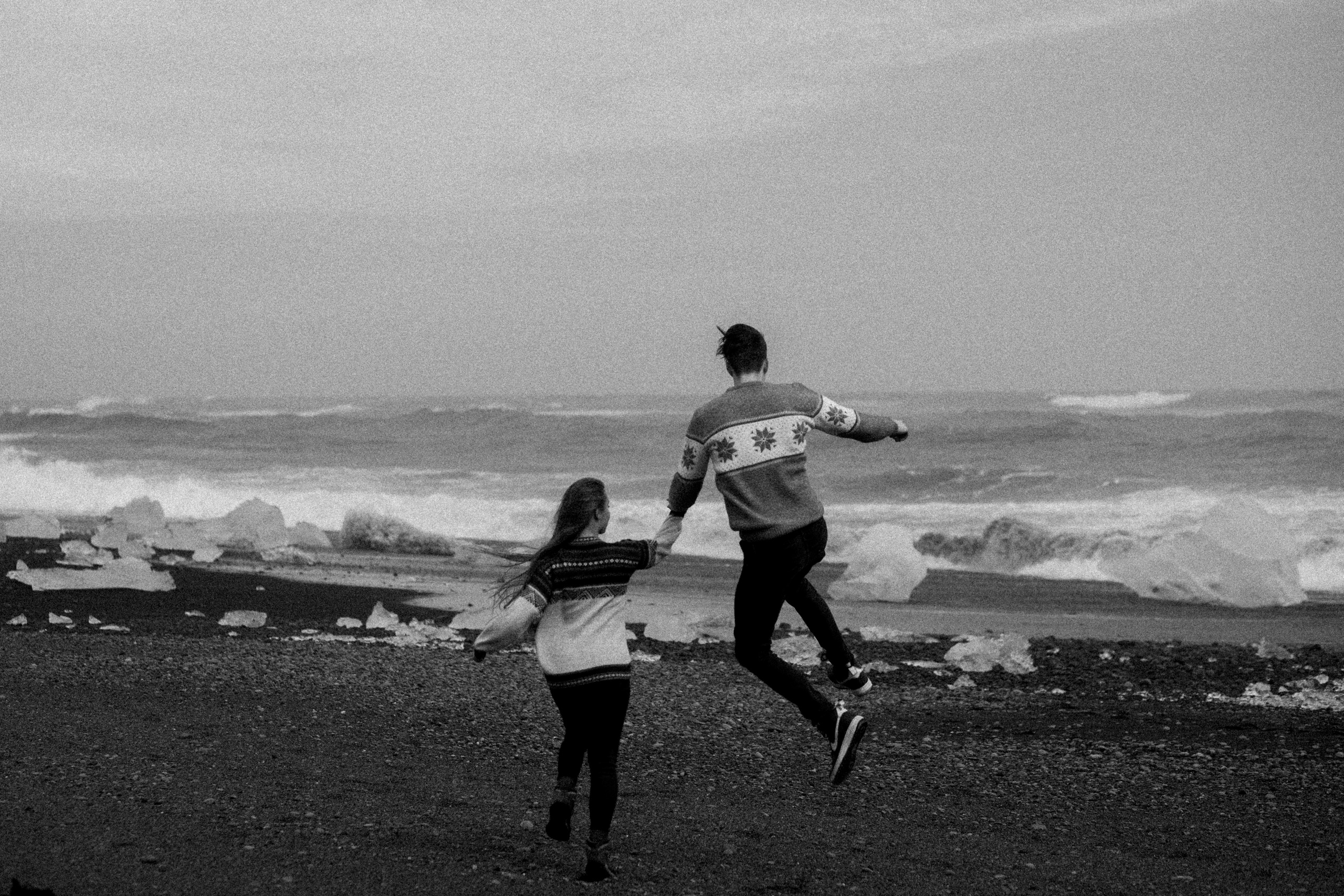 Couple photoshoot in front of volcano eruption in Iceland. Iceland elopement photographer & videographer