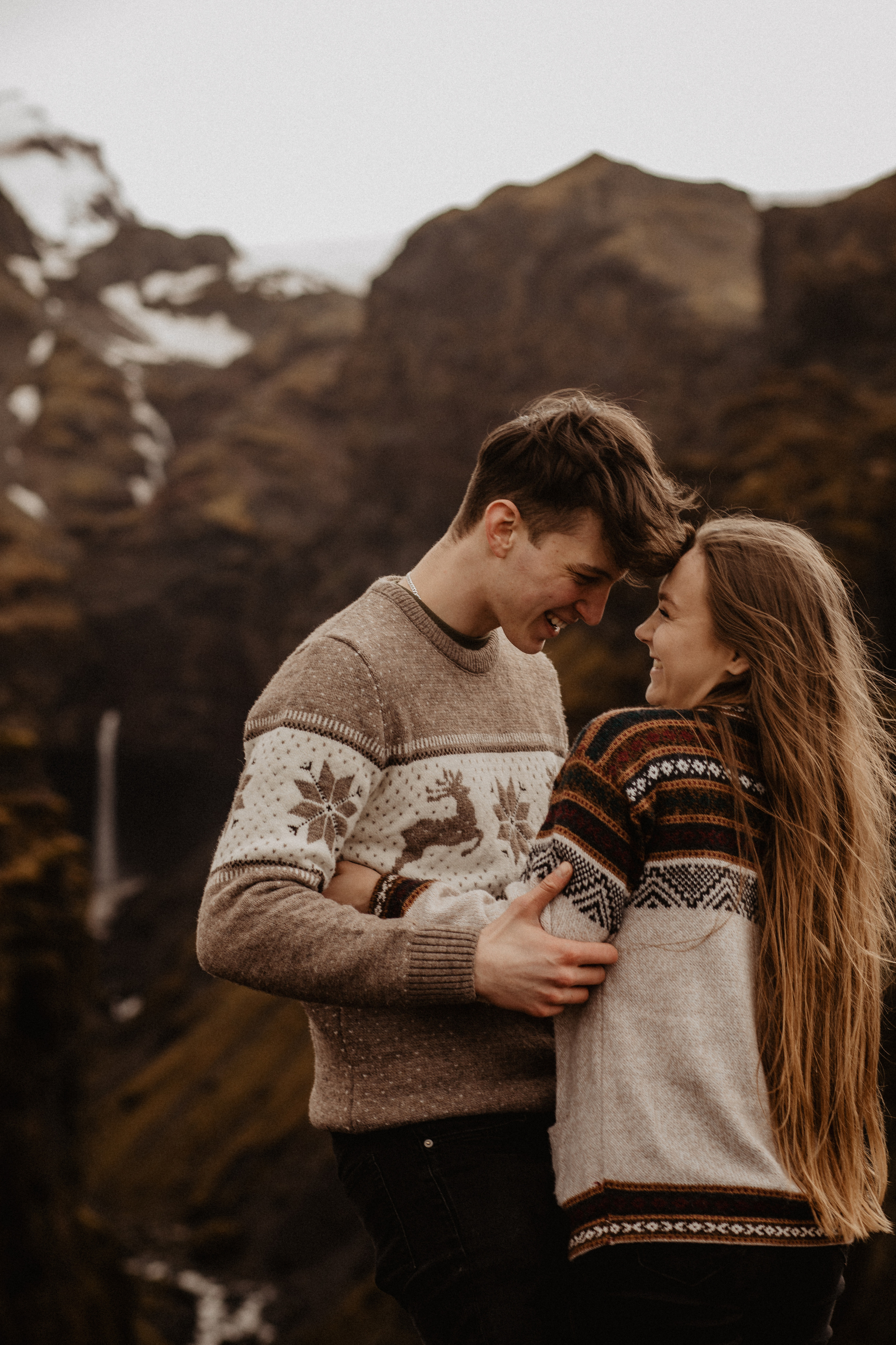 Couple photoshoot in front of volcano eruption in Iceland. Iceland elopement photographer & videographer