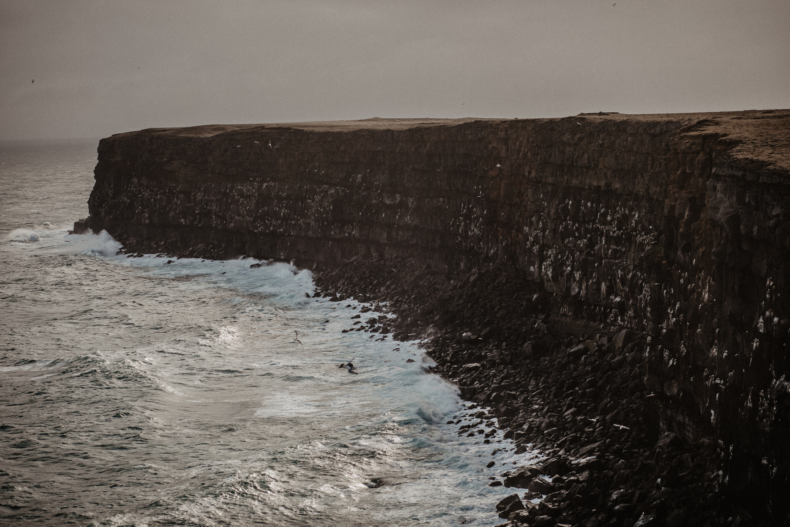 Couple photoshoot in front of volcano eruption in Iceland. Iceland elopement photographer & videographer