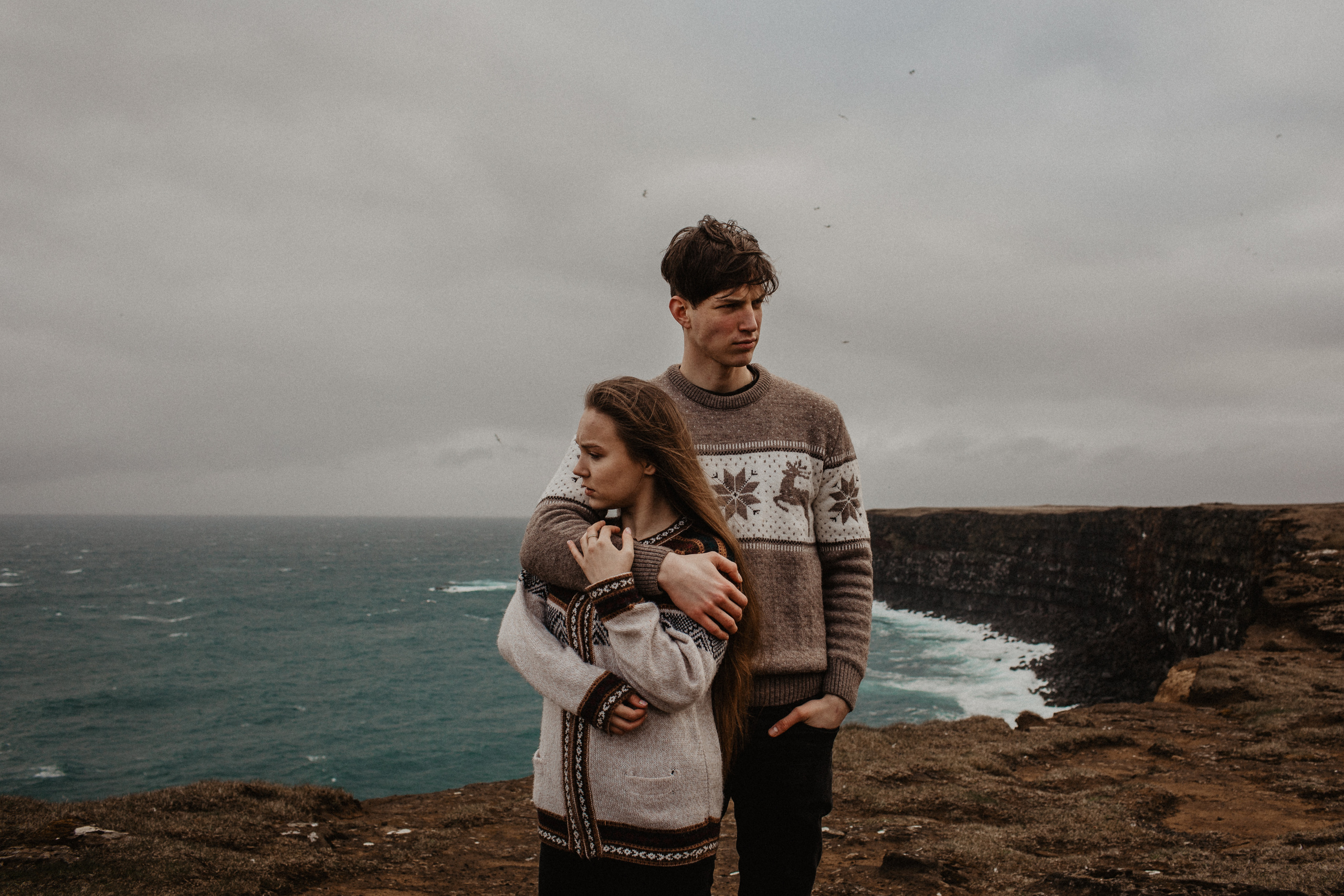 Couple photoshoot in front of volcano eruption in Iceland. Iceland elopement photographer & videographer