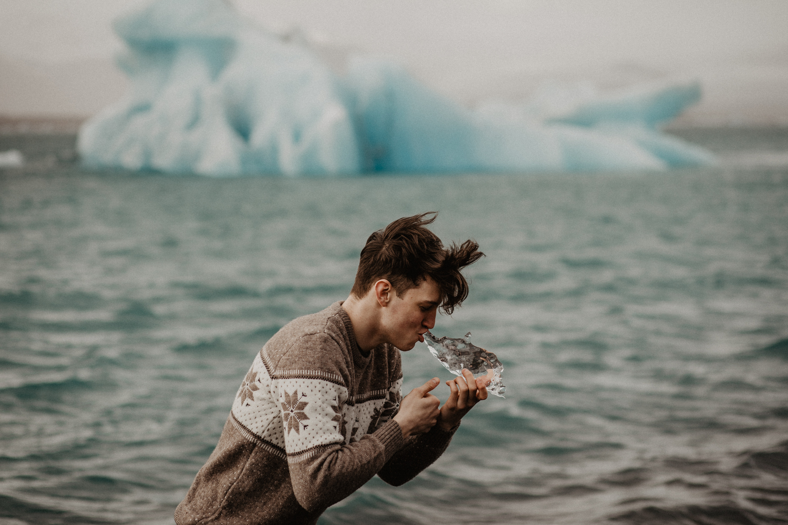 Couple photoshoot in front of volcano eruption in Iceland. Iceland elopement photographer & videographer