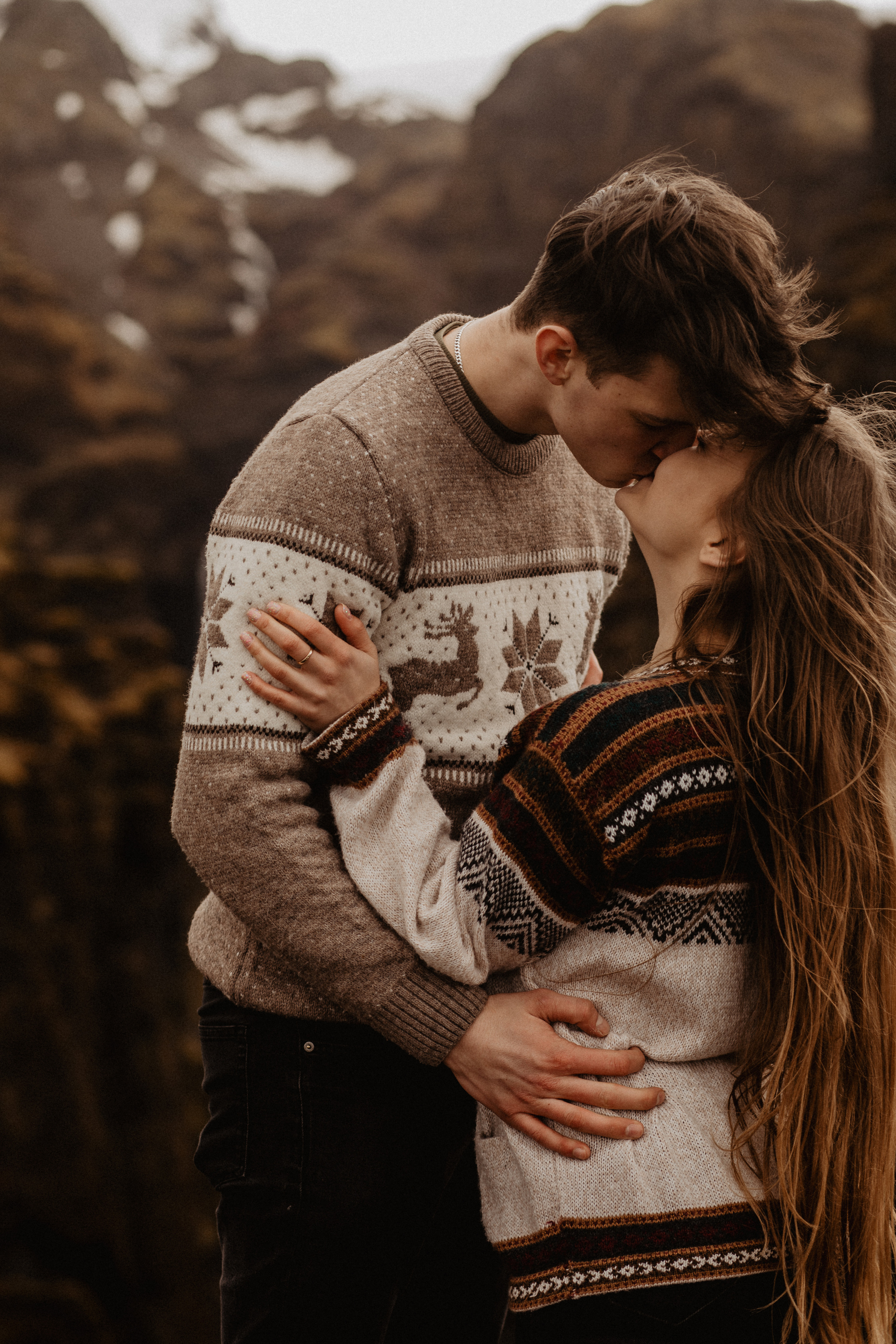 Couple photoshoot in front of volcano eruption in Iceland. Iceland elopement photographer & videographer